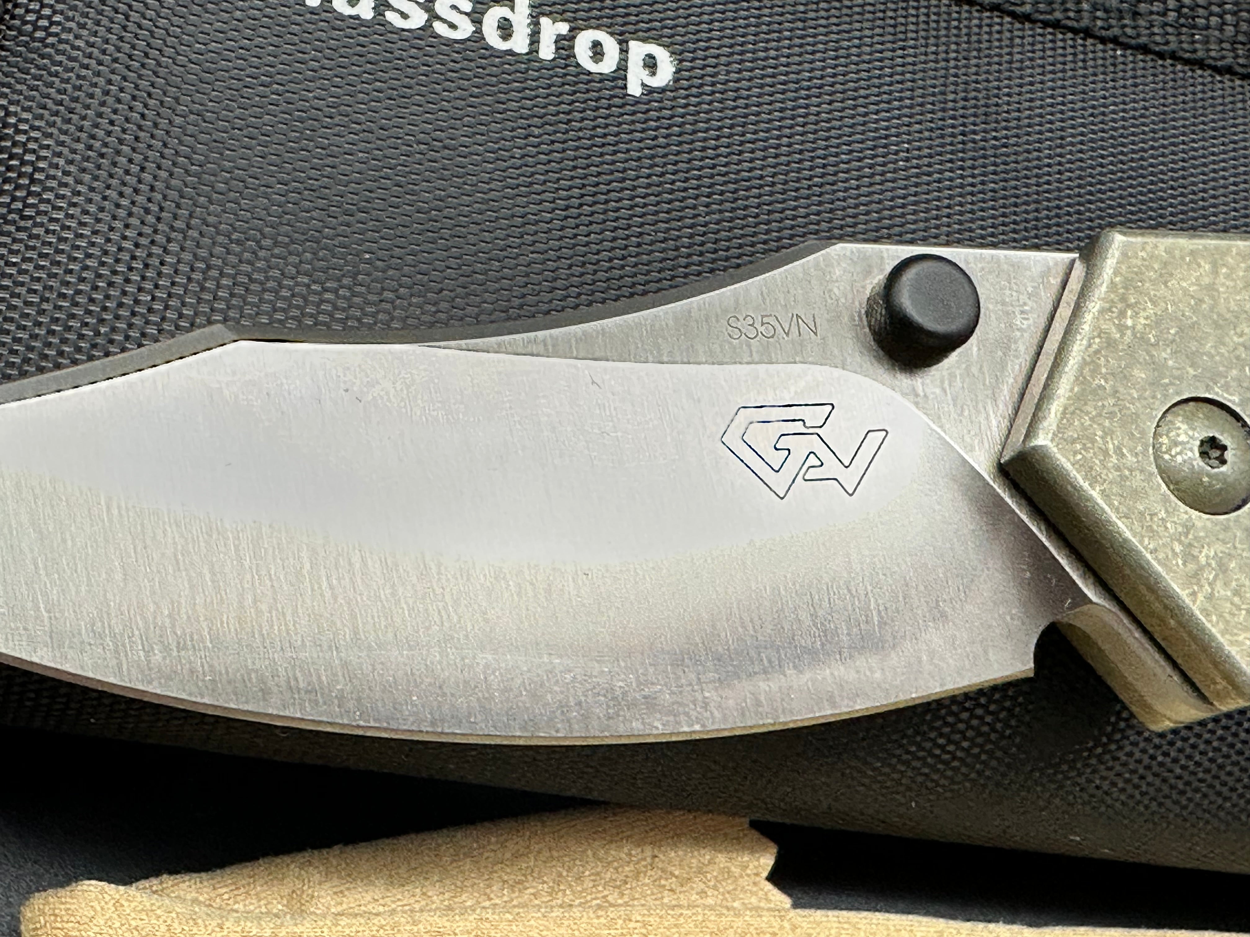 Massdrop Gavko Thresher: Gavko design. 3.5 inch satin finish, clip point CPM-S35VN blade. Tumbled and anodized copper titanium frame