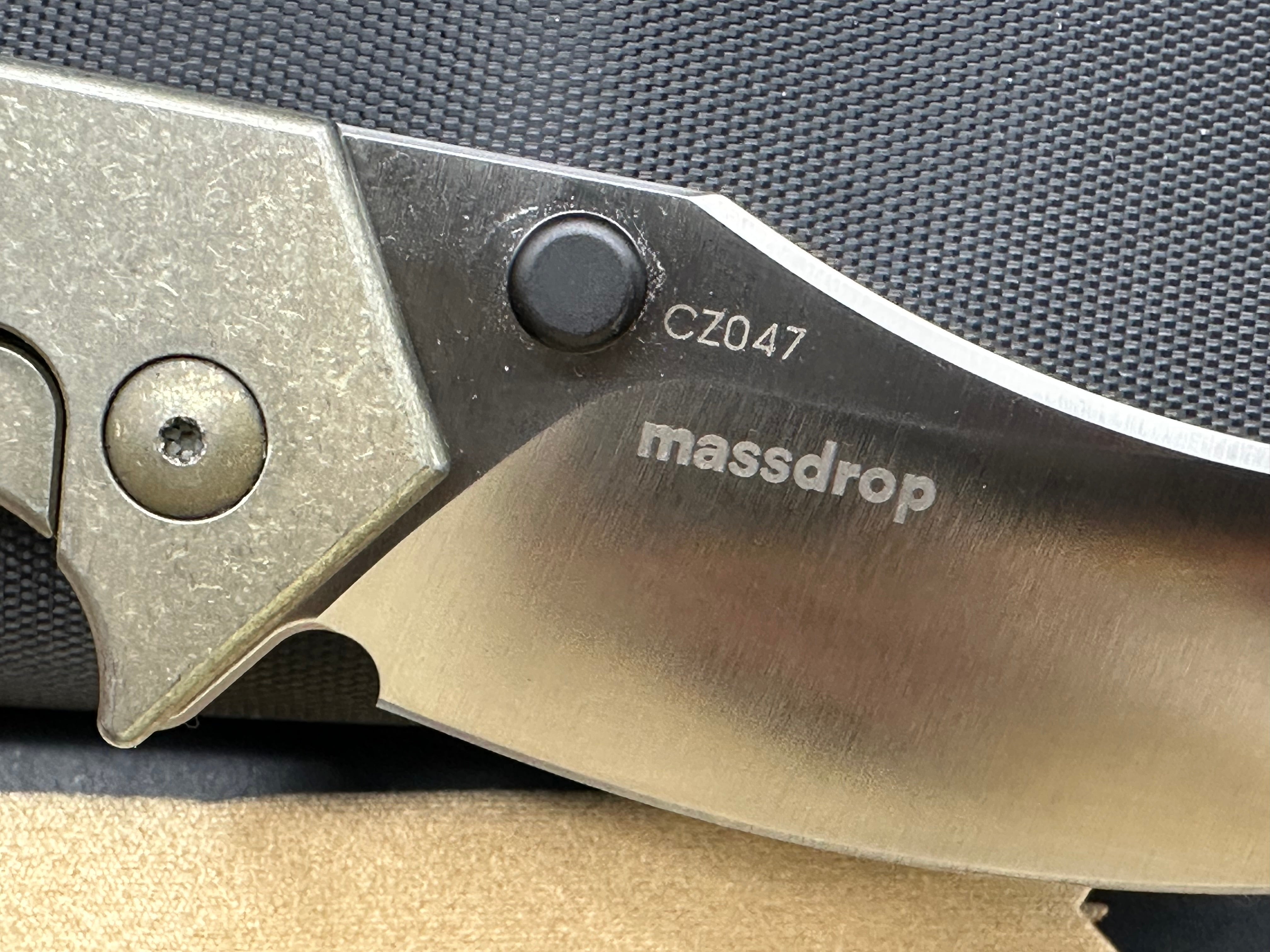 Massdrop Gavko Thresher: Gavko design. 3.5 inch satin finish, clip point CPM-S35VN blade. Tumbled and anodized copper titanium frame