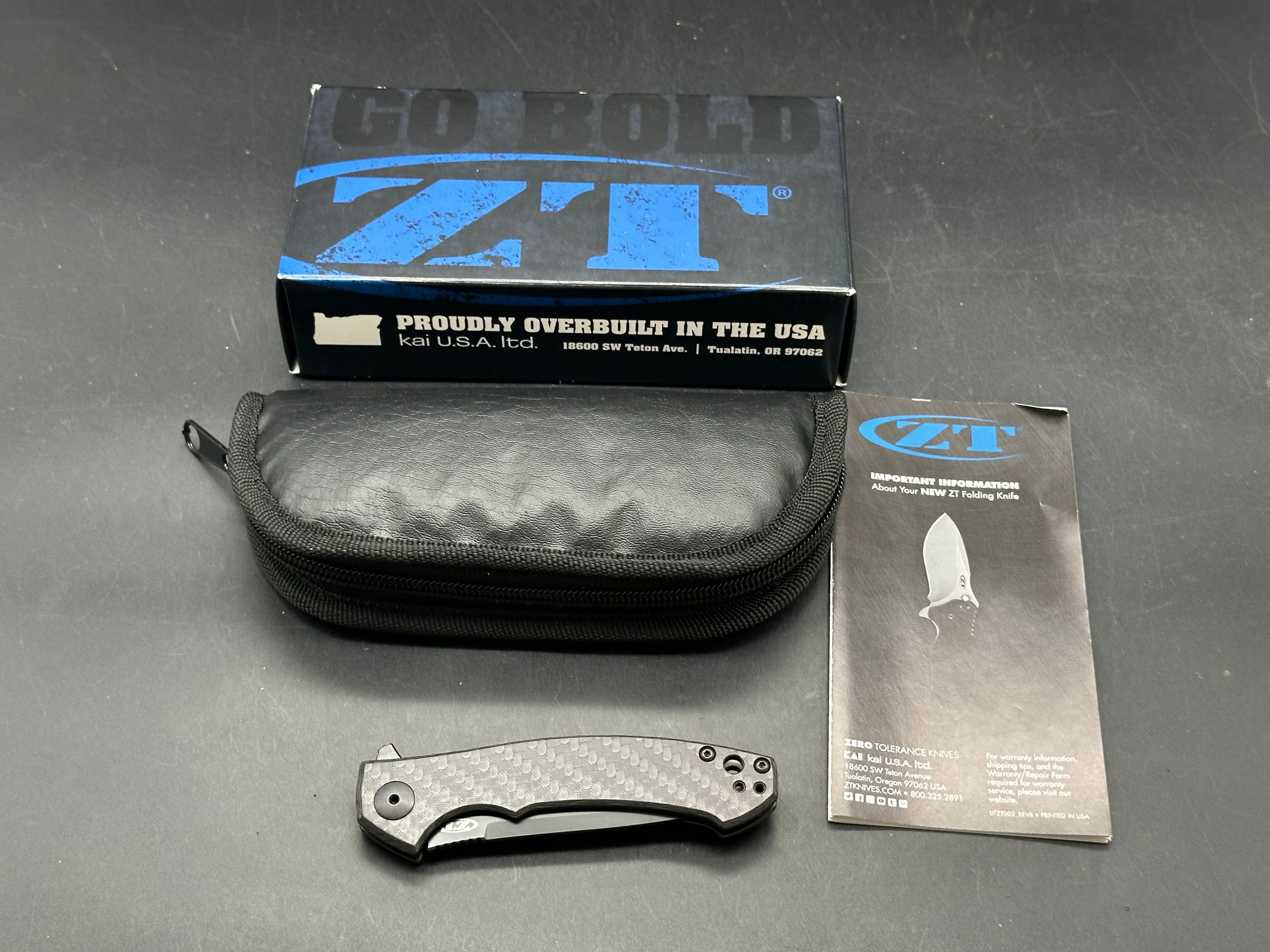 Zero Tolerance ZT 450 Sinkevich design: Dmitry Sinkevich design. 3.25 inch DLC black, stonewashed, drop point CPM-S35VN blade