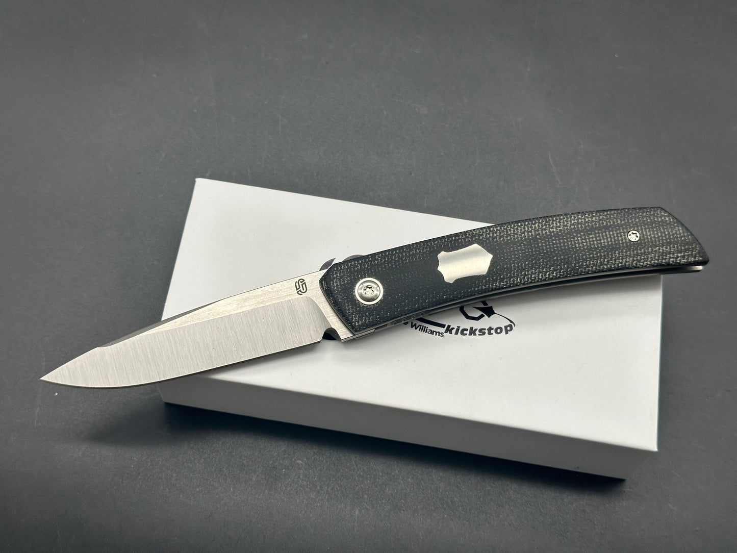 Jared Oeser F-22 Kickstop Flipper Knife Black Micarta Black HW (3.4" Satin)