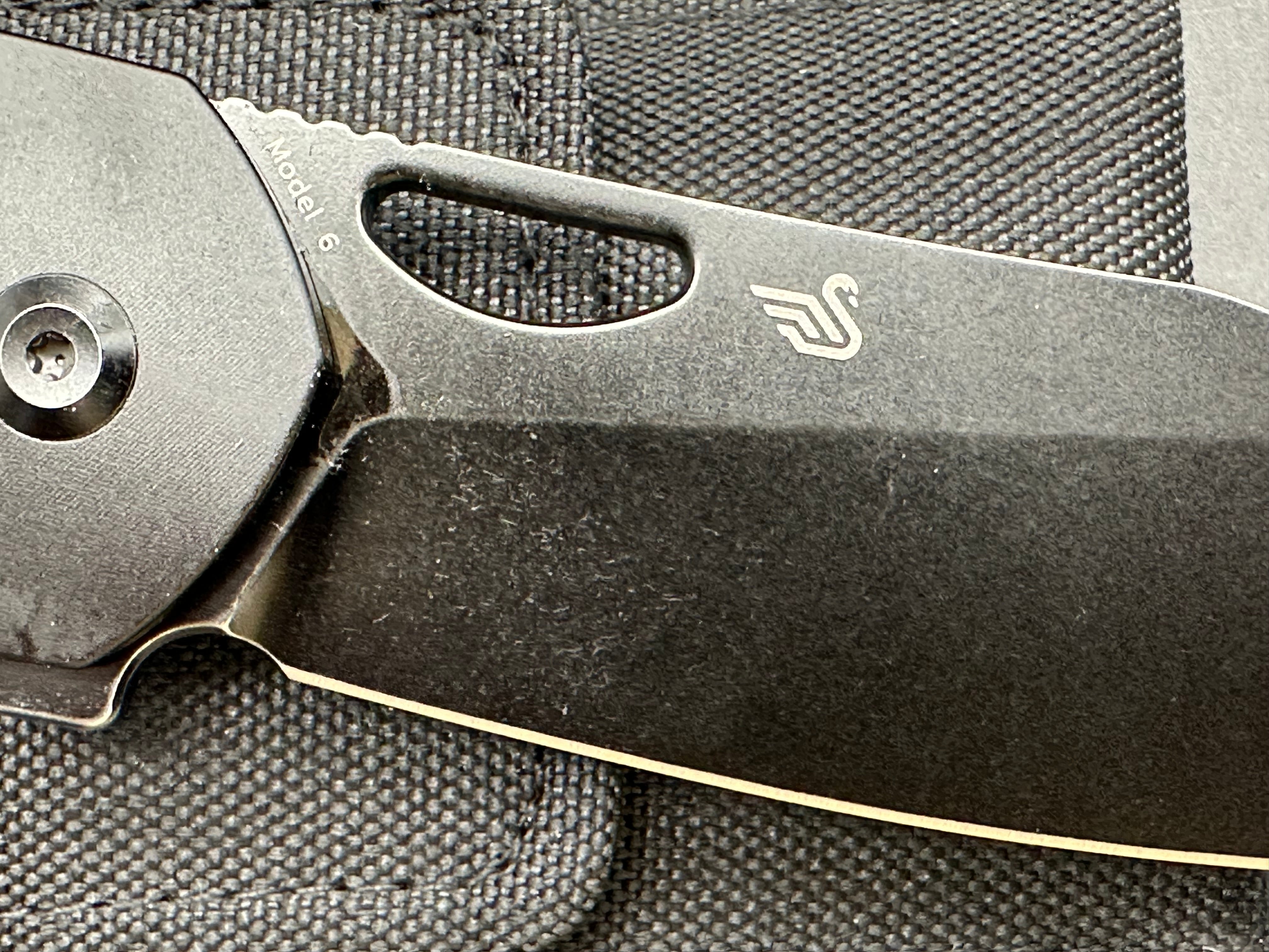 Kansept Model 6: Nick Swan design. 3.1 inch stonewashed, flat grind, black anodized CPM-S35VN sheepsfoot blade