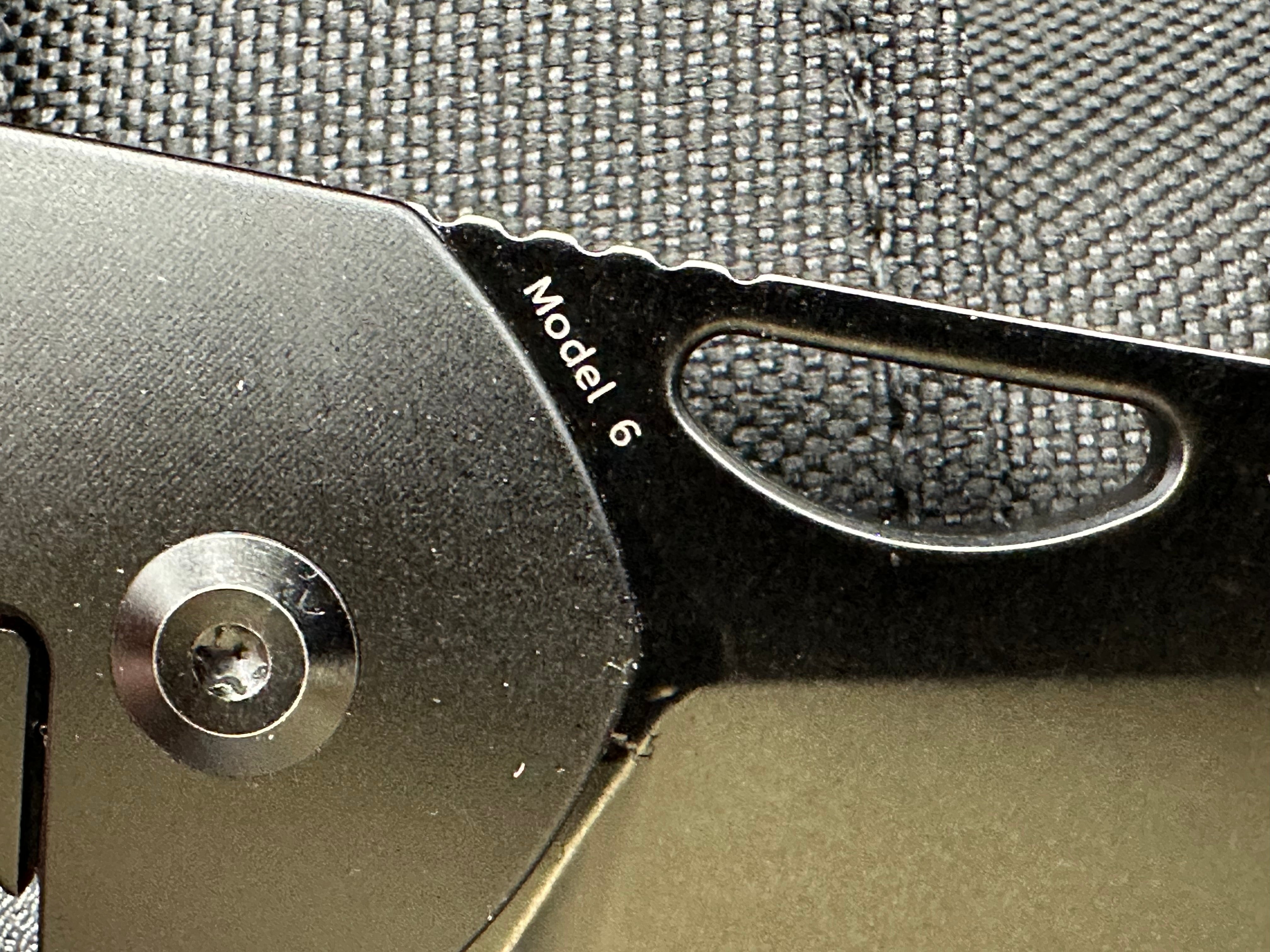 Kansept Model 6: Nick Swan design. 3.1 inch stonewashed, flat grind, black anodized CPM-S35VN sheepsfoot blade