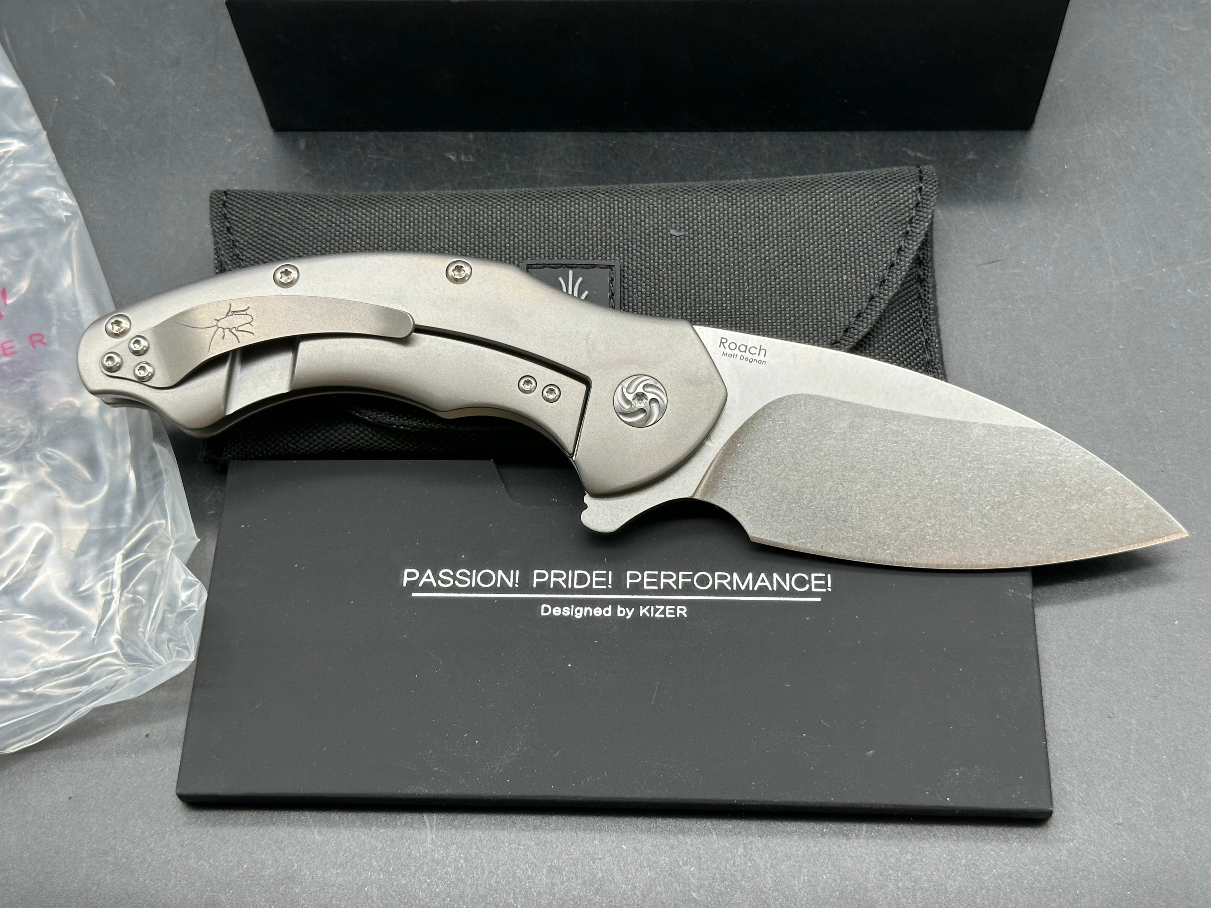 Kizer Roach Matt Degnan design 3.5 inch drop point flat grind, satin CPM-S35VN blade Titanium scales and clip with Roach insignia