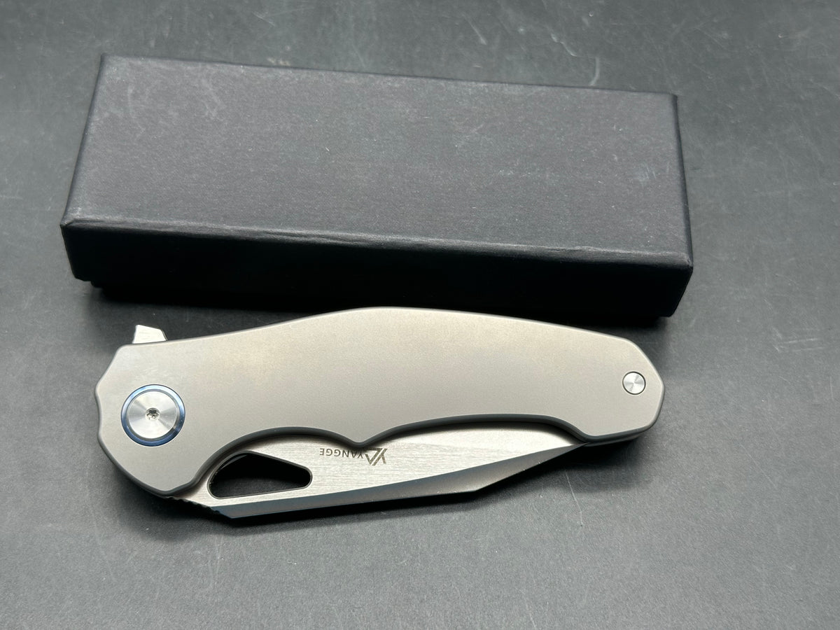 Yangge YG005 titanium handle w/Elmax blade