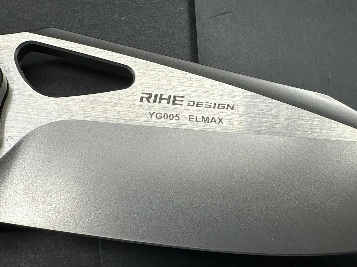 Yangge YG005 titanium handle w/Elmax blade