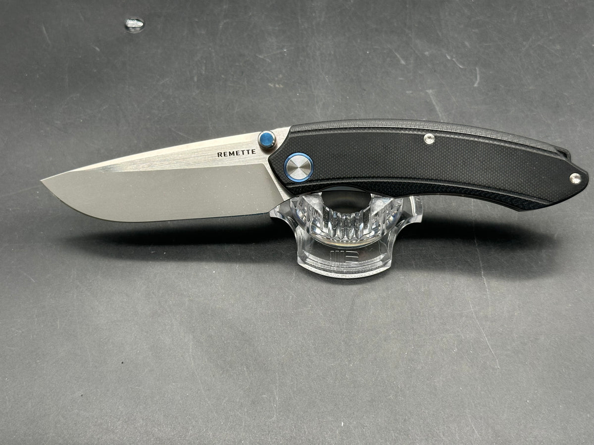 Remette Wild Species black G10 handle w/14c28n blade