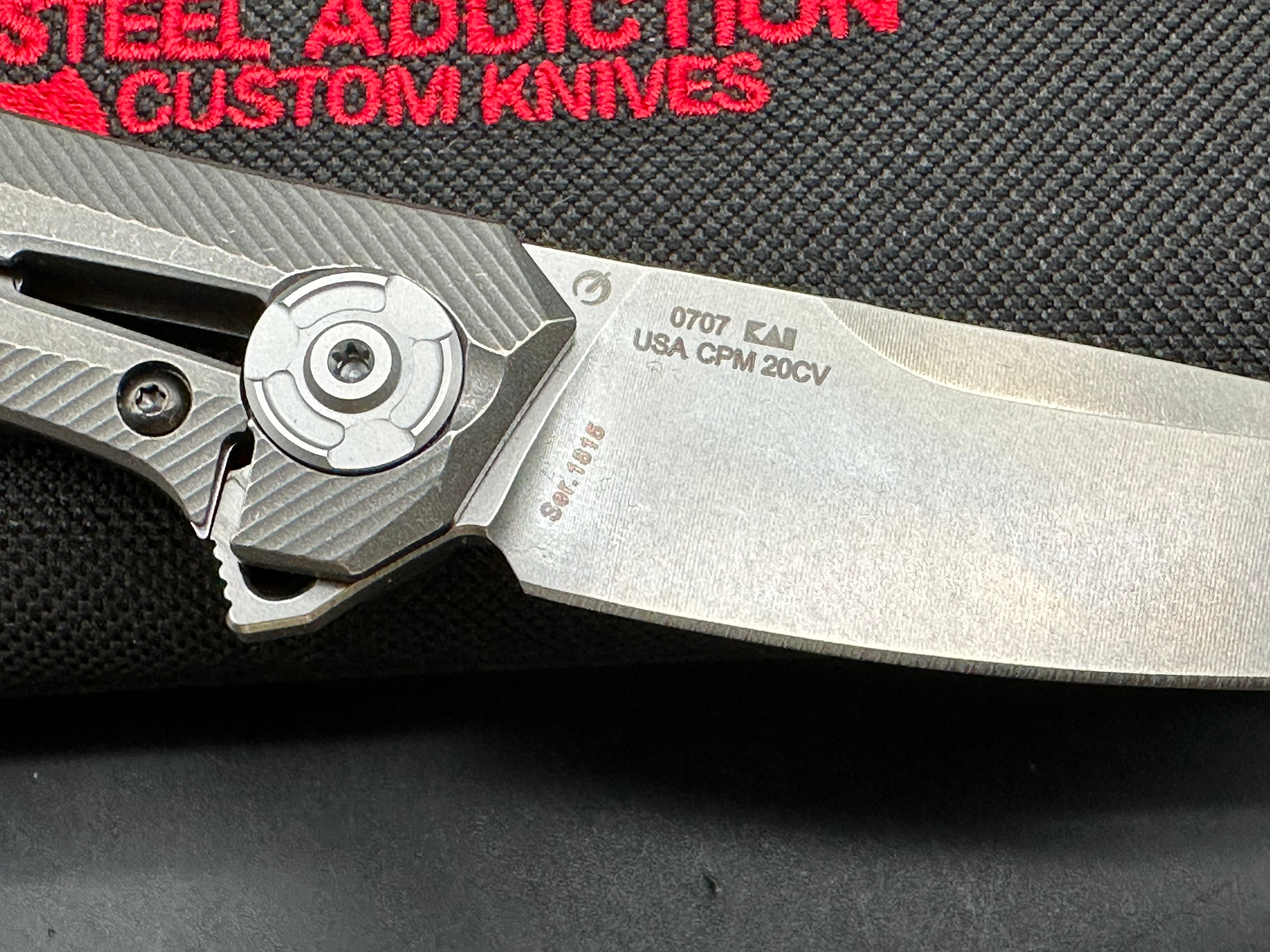 Zero Tolerance ZT 0707: 3.625 inch tumbled, drop point CPM-20CV blade. Titanium handle