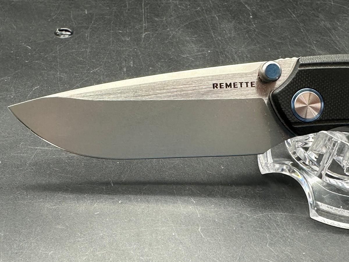 Remette Wild Species black G10 handle w/14c28n blade