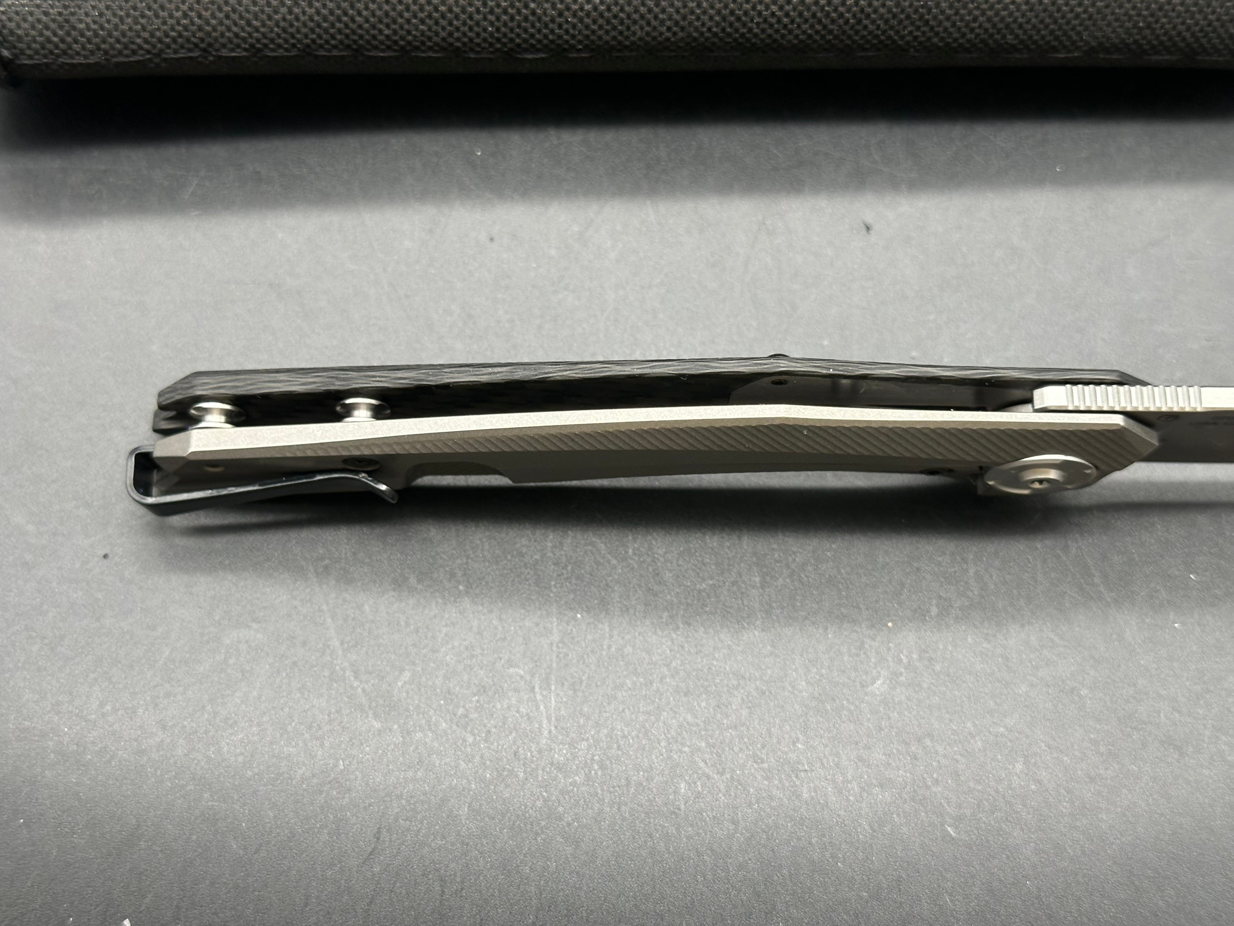 Zero Tolerance ZT 0707: 3.625 inch tumbled, drop point CPM-20CV blade. Titanium handle