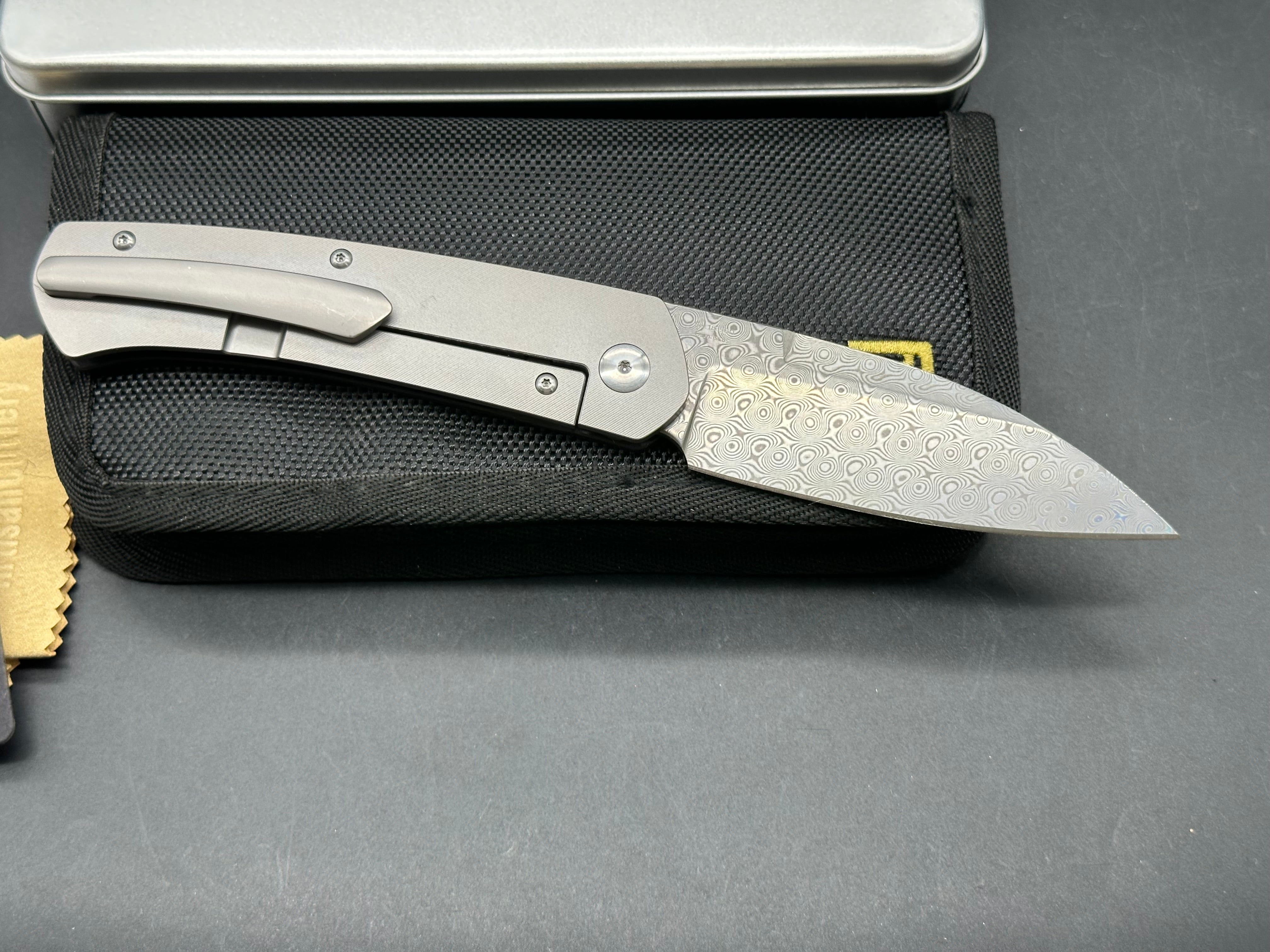 Artisan Cutlery Centauri: 3.5 inch Damascus blade. Front flipper. Carbon fiber front scale