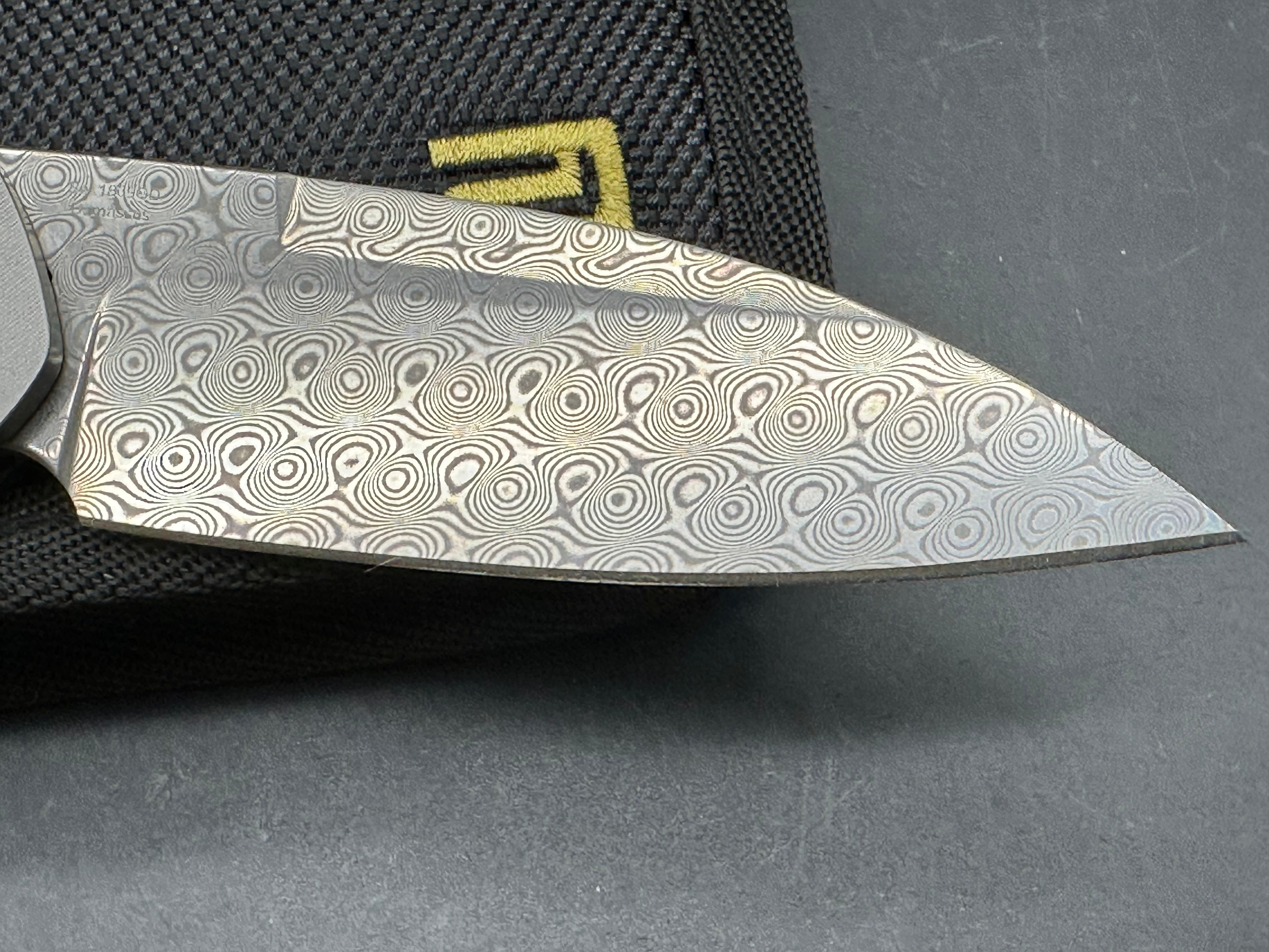 Artisan Cutlery Centauri: 3.5 inch Damascus blade. Front flipper. Carbon fiber front scale
