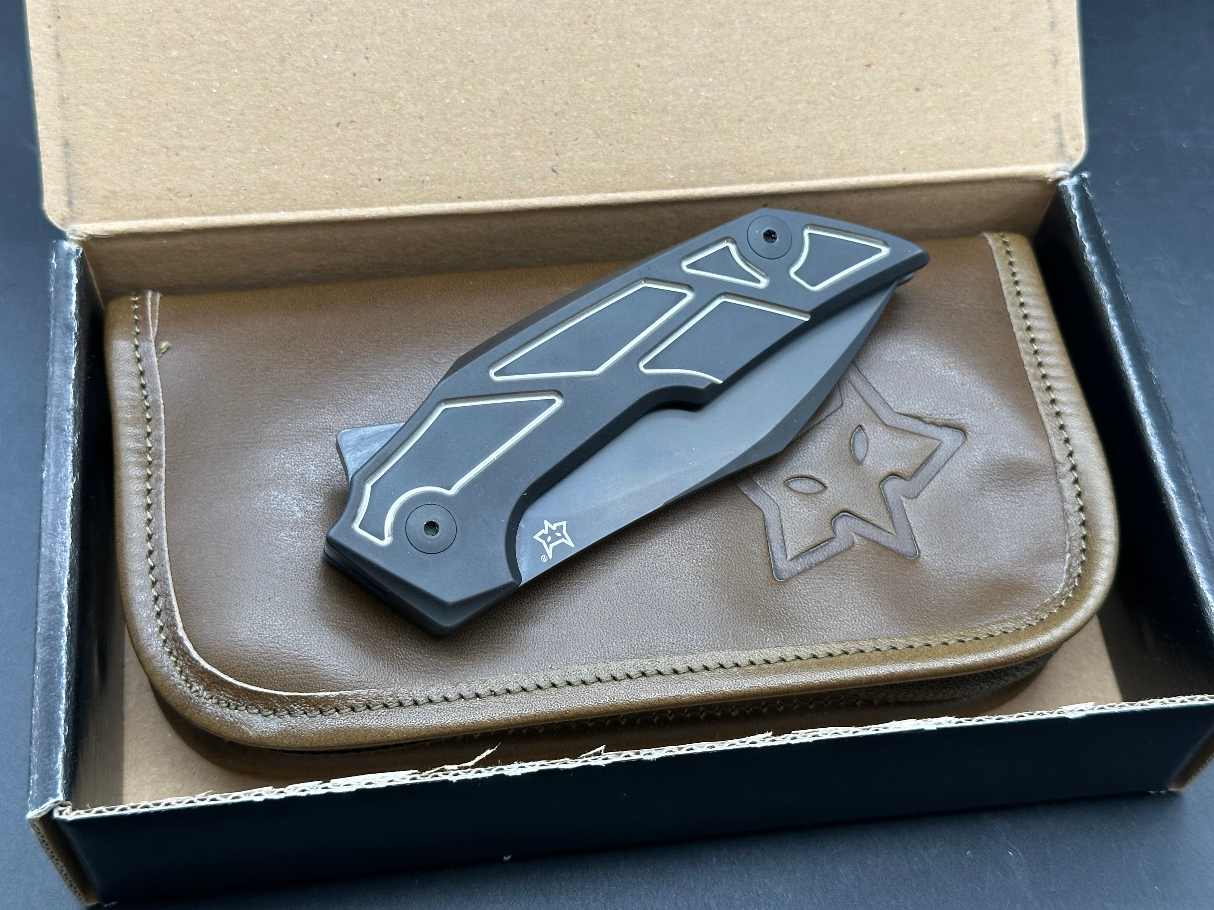 Fox Knives Phoenix: Tashi Bharucha design. Made in Italy. 3.54 inch Bohler M390 blade. Machined titanium handle
