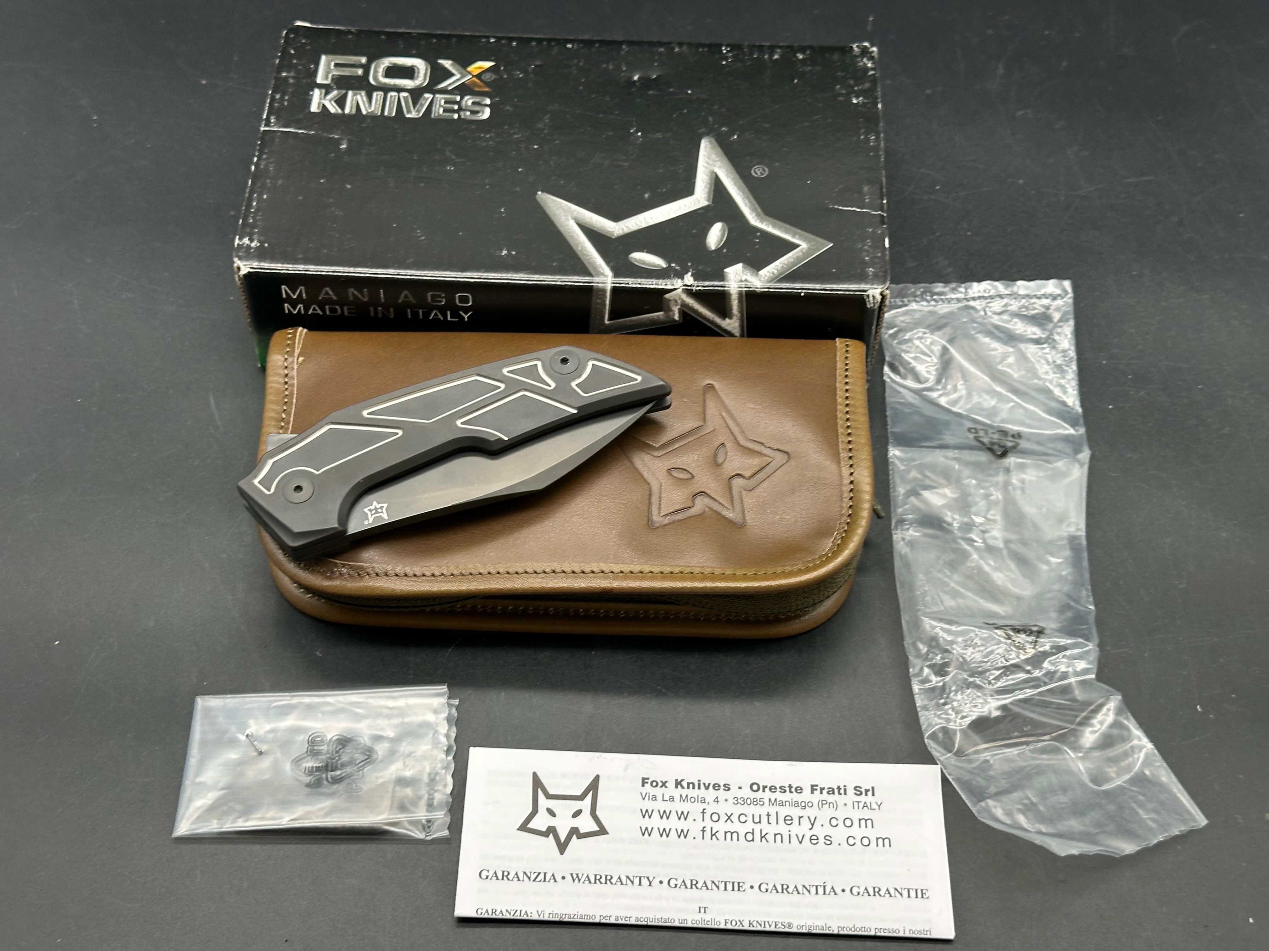 Fox Knives Phoenix: Tashi Bharucha design. Made in Italy. 3.54 inch Bohler M390 blade. Machined titanium handle