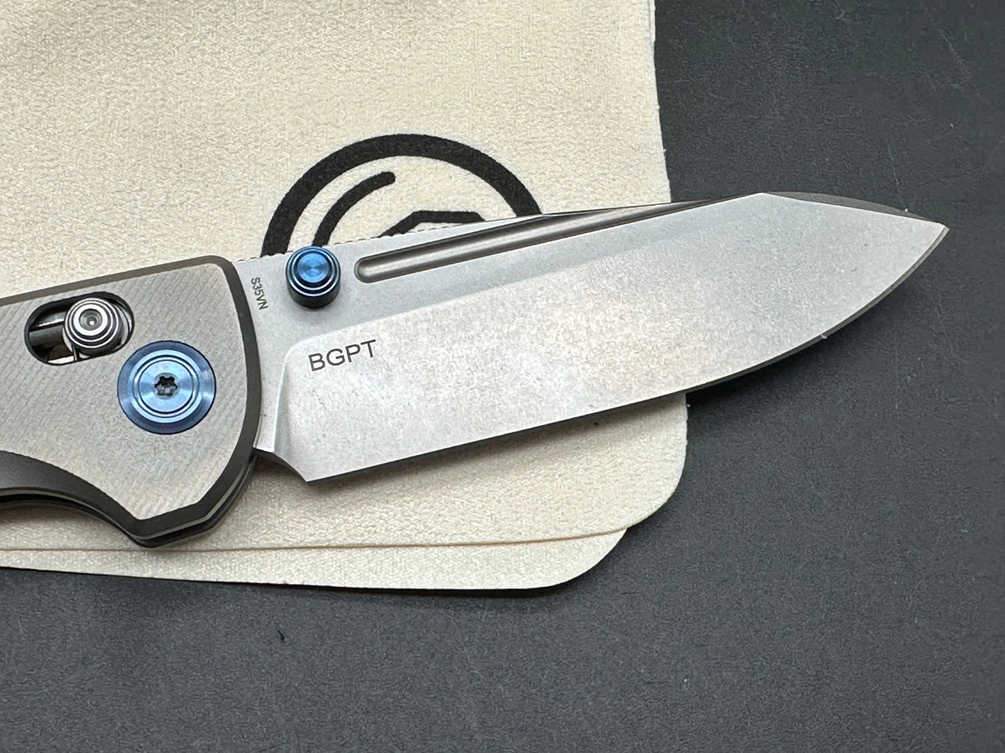 Kubey Bluff S35VN Drop Point Blade with Textured Titanium Handle