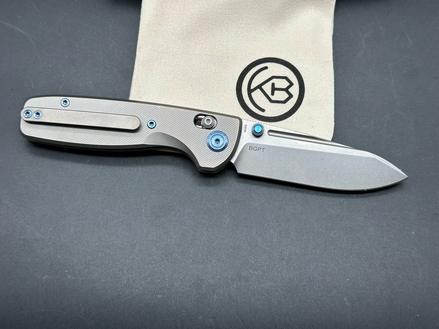 Kubey Bluff S35VN Drop Point Blade with Textured Titanium Handle