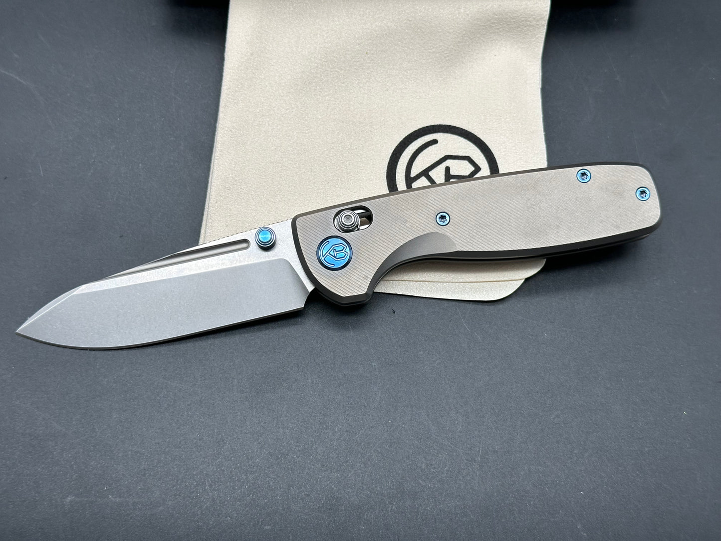 Kubey Bluff S35VN Drop Point Blade with Textured Titanium Handle