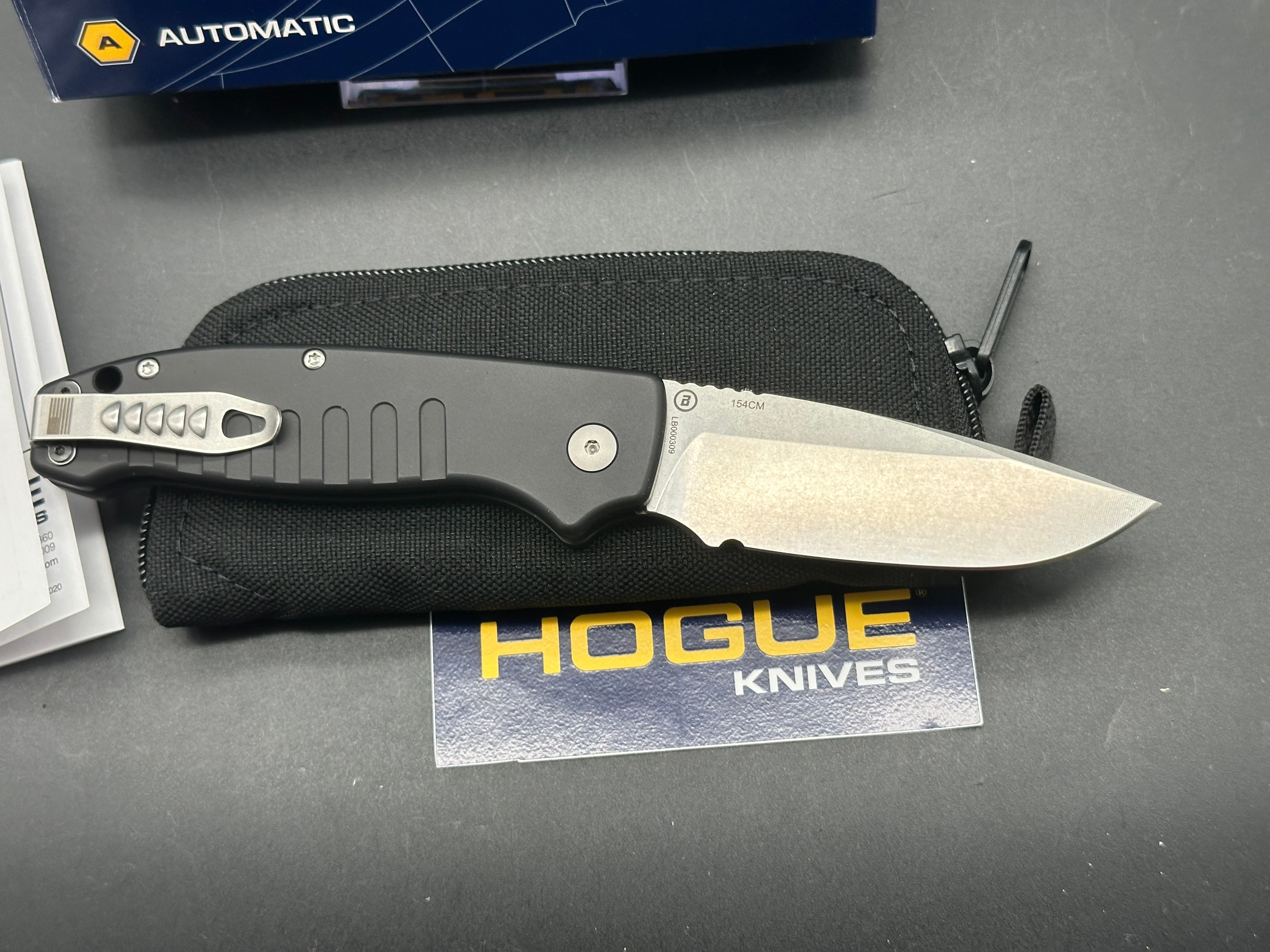 Hogue Ballista Drop Point Auto Black Aluminum 3.5" Blade – 154CM Steel. Button Lock