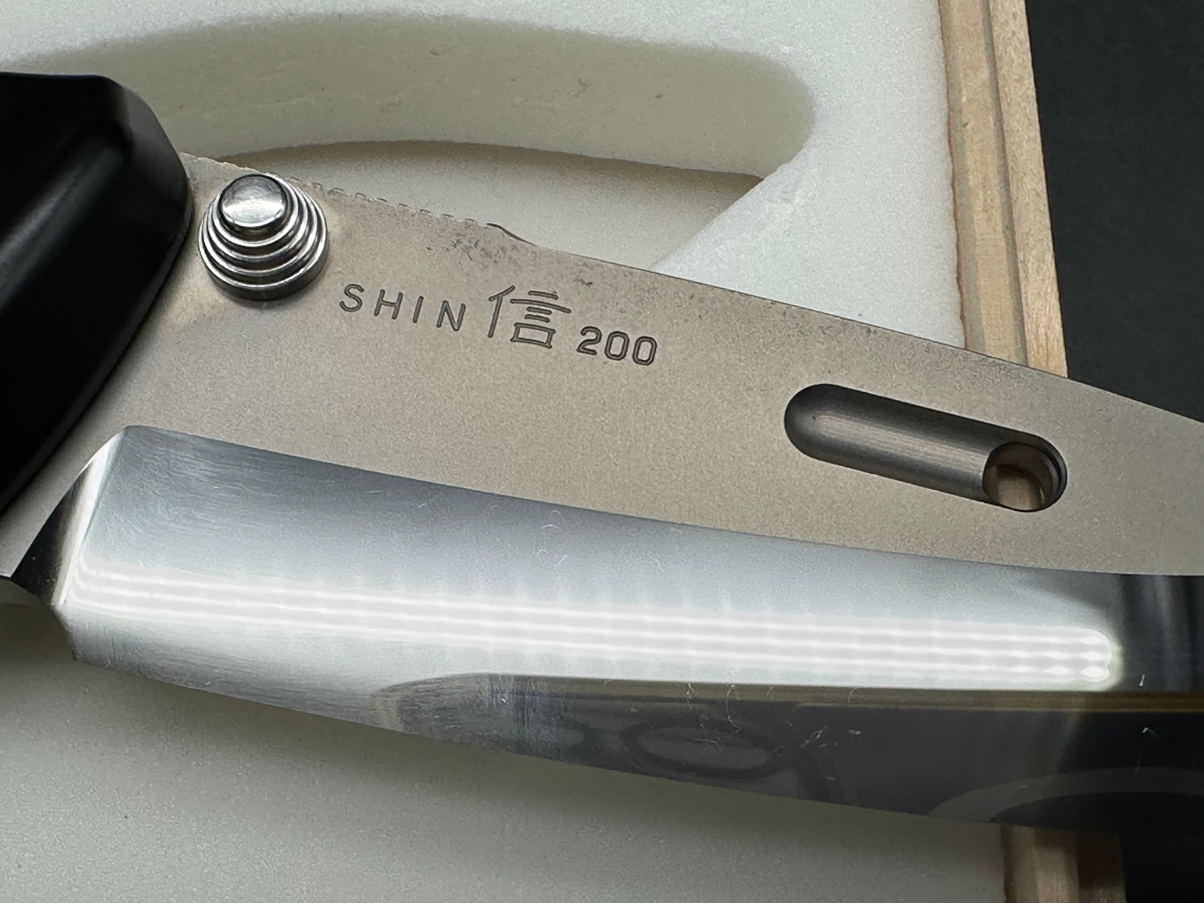 Rockstead Shin WIth mirror polished blade