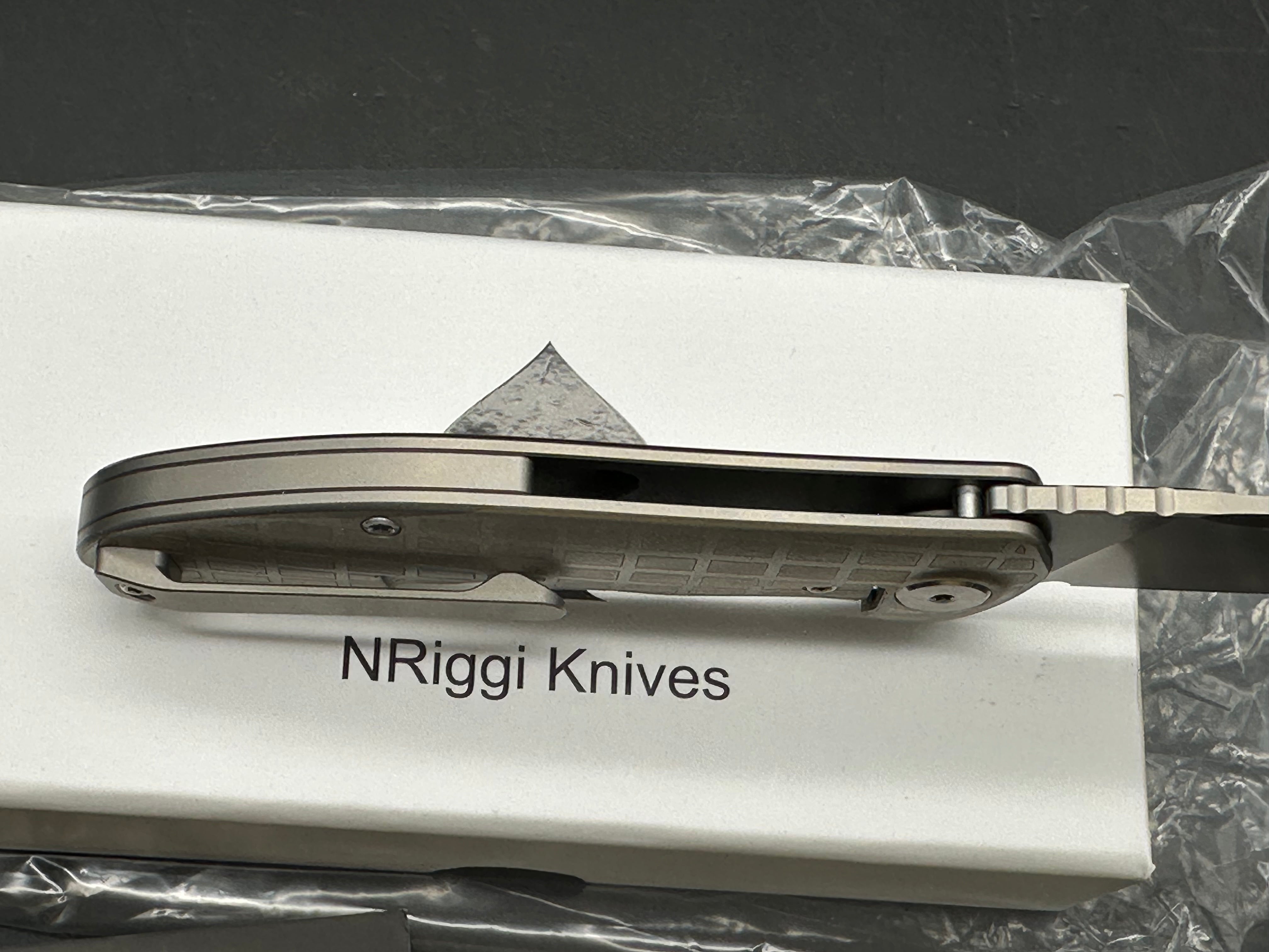 NRiggi Knives "JERSEY" Laser Engraved Wave Titanium Scales w/CPM 20CV bead blast blade