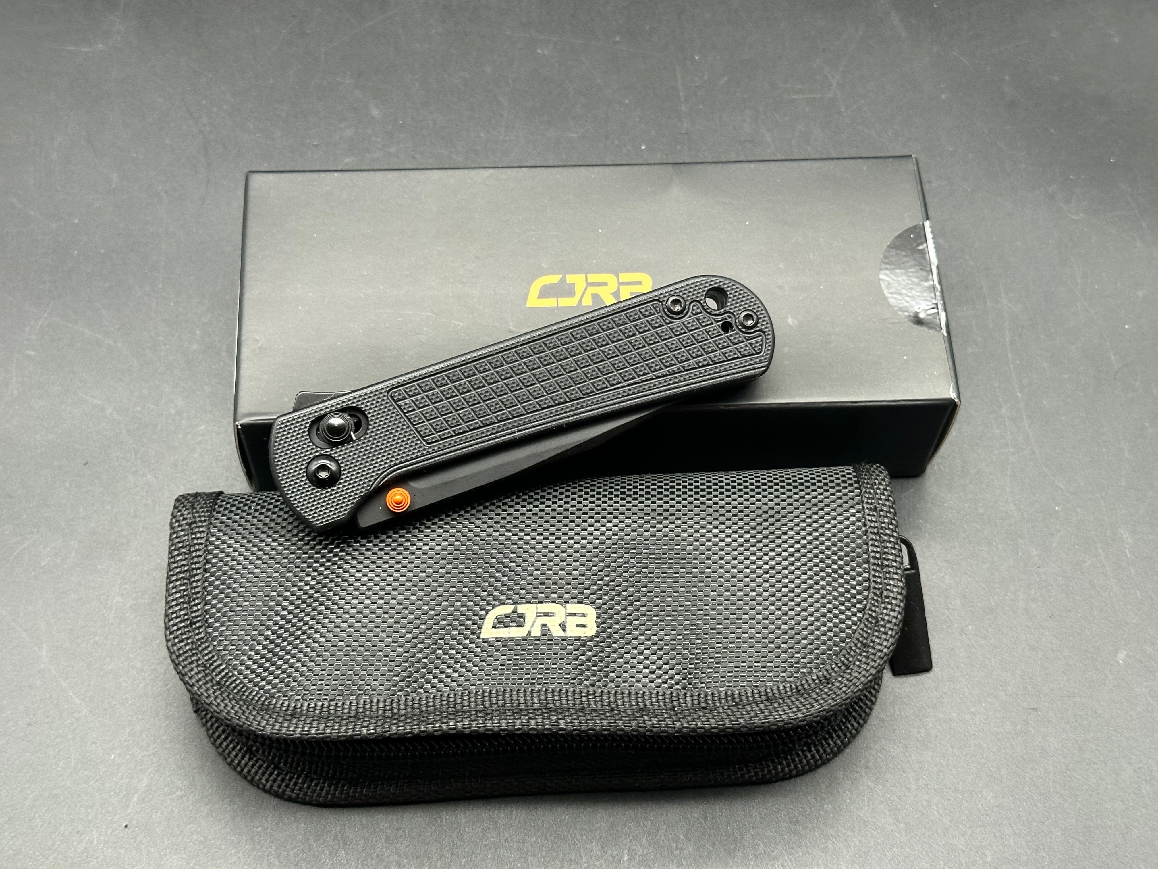 CJRB BOLT BLACK G10 HANDLE AR-RPM9 DROP POINT PLAIN EDGE BLACK PVD FINISH