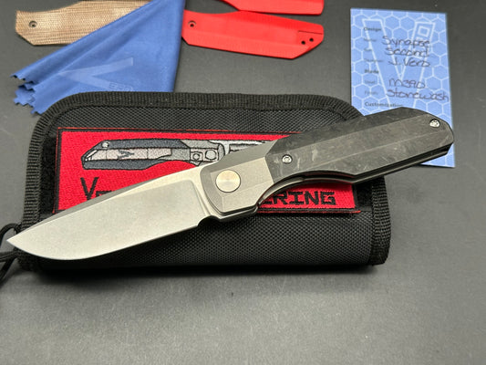 Vero Engineering Synapse Gen 2, Stonewashed 3.2 inch M390 blade, Marbled Carbon fiber scales plus 2 more, Zircuti clip and backspacer