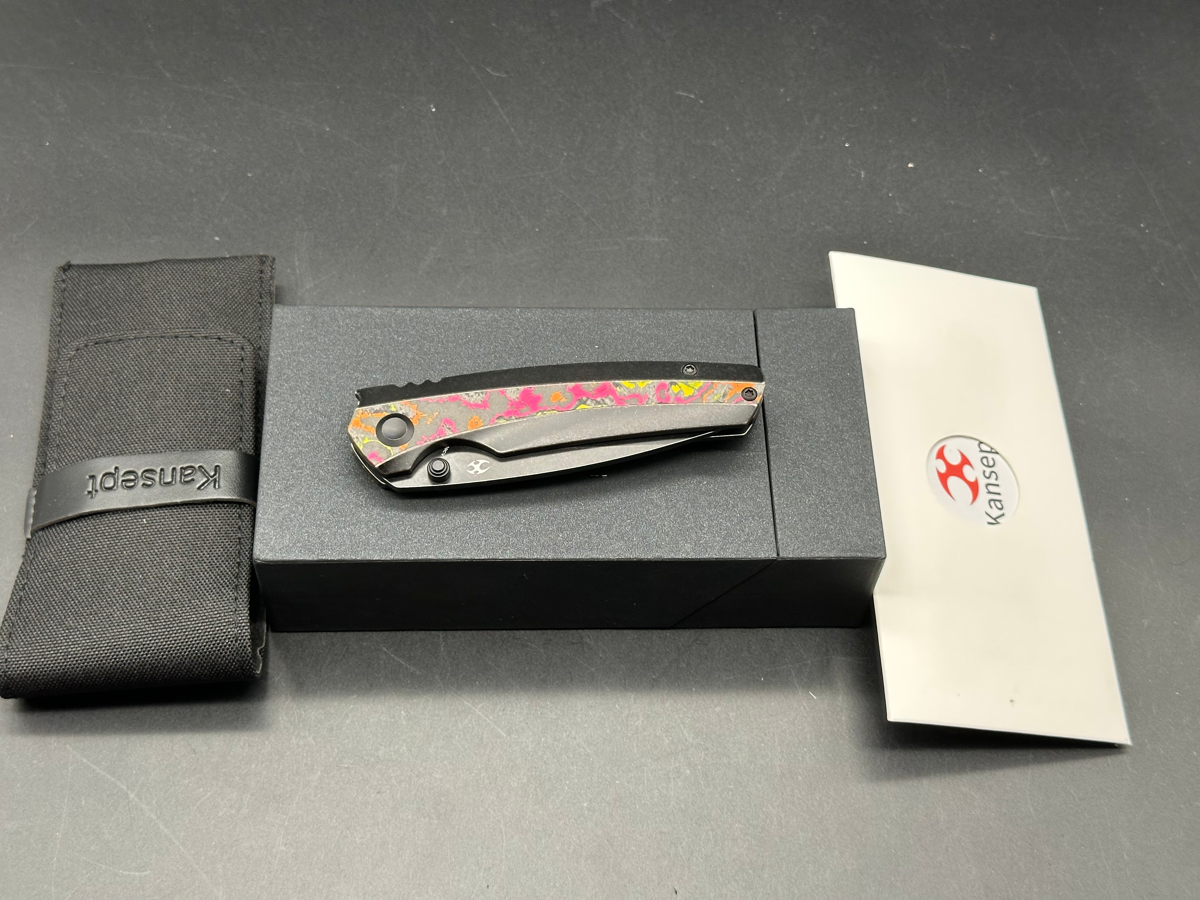 KANSEPT RAVEN BLACKWASH TITANIUM WTIH FLO PARTY CAMOCARBON HANDLE (3.13" CPM 20CV BLADE)