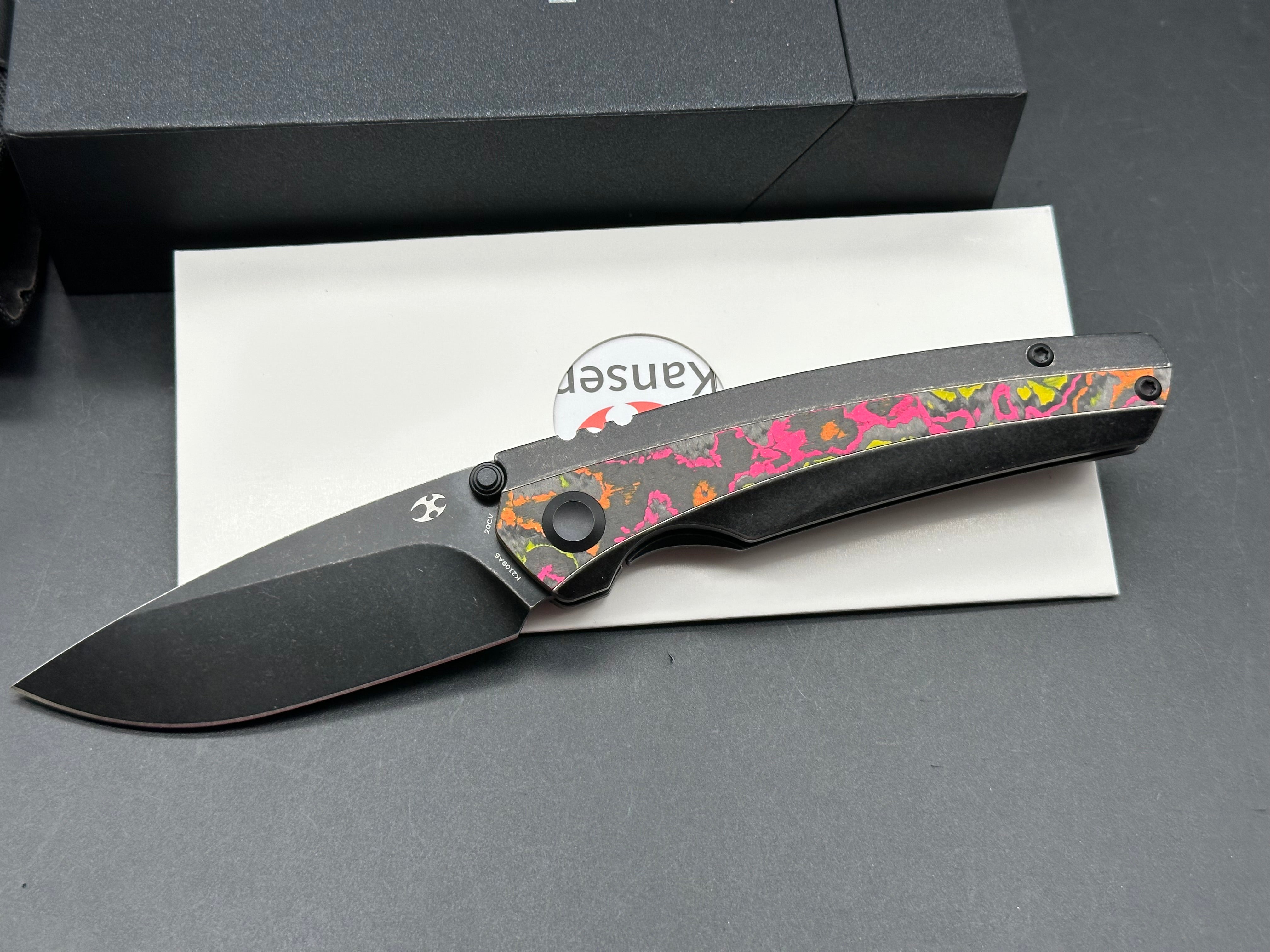 KANSEPT RAVEN BLACKWASH TITANIUM WTIH FLO PARTY CAMOCARBON HANDLE (3.13" CPM 20CV BLADE)