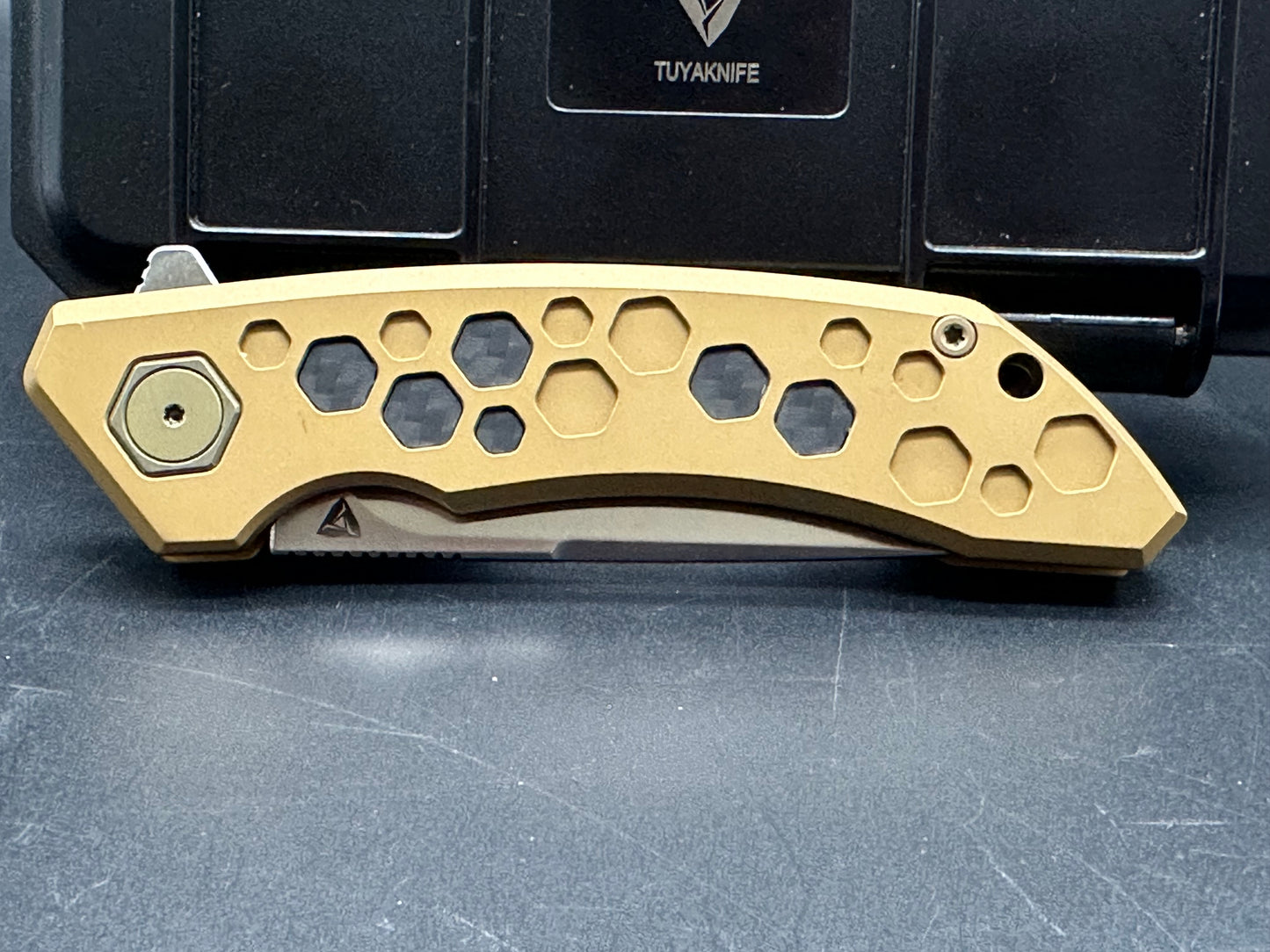 Tuya Hive 2 M390 Satin Honey Titanium w/CF inserts Drop Point