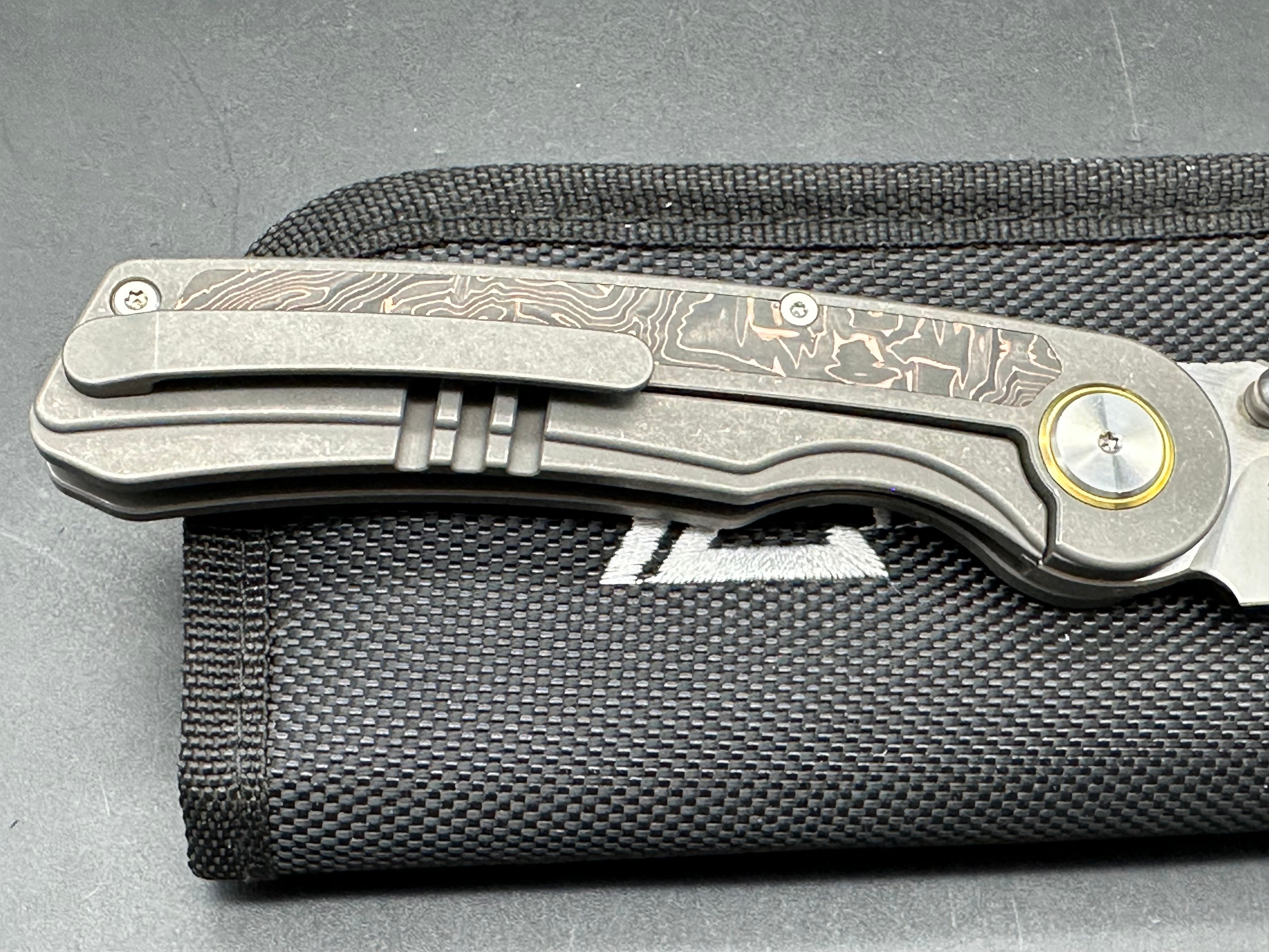 YANGGE FOLDING KNIFE SANDWASHED TITANIUM COPPER FOIL CARBON FIBER HANDLE S90V