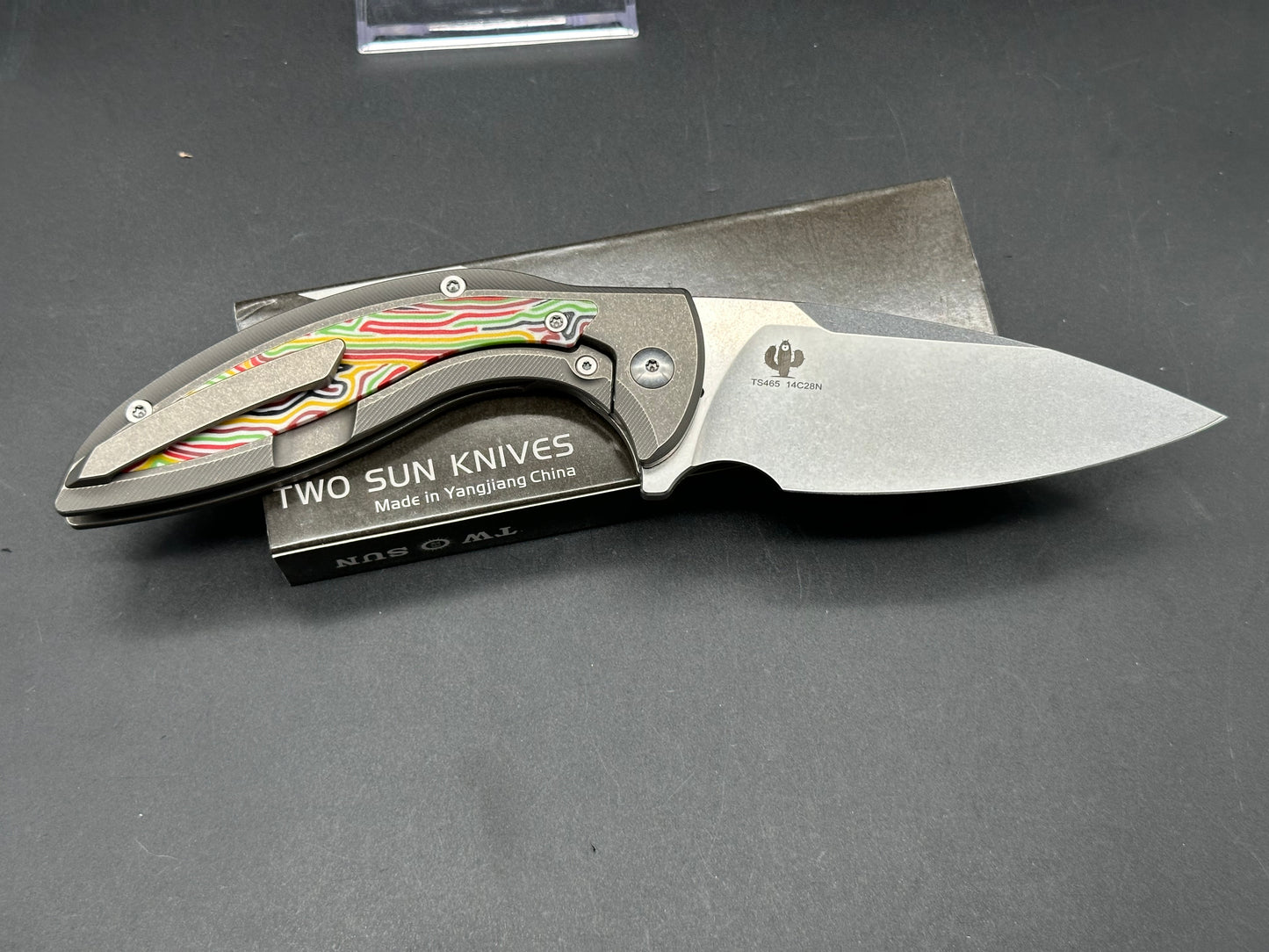 TWO SUN FOLDING KNIFE TITANIUM & MULTI-COLOR G10 HANDLE 14C28N PLAIN EDGE STONEWASH FINISH TS465