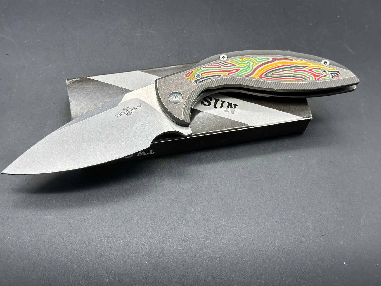 TWO SUN FOLDING KNIFE TITANIUM & MULTI-COLOR G10 HANDLE 14C28N PLAIN EDGE STONEWASH FINISH TS465