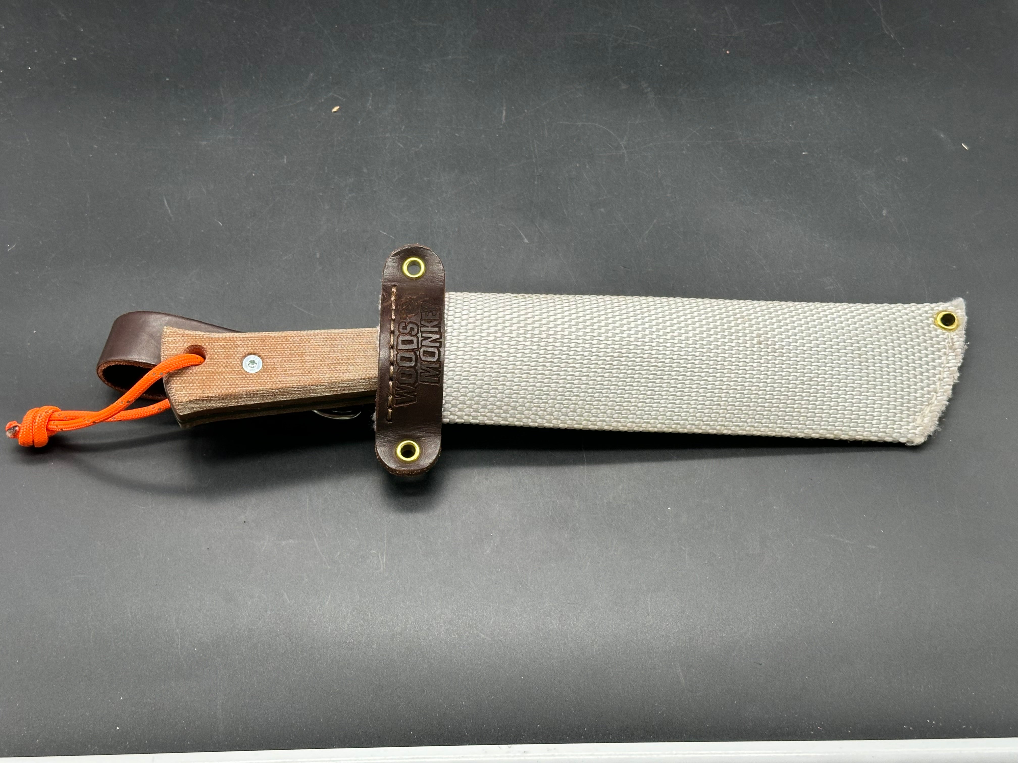 Woods Monkey Half Chete 1095 steel with OD green cerakote and natural canvas micarta handles