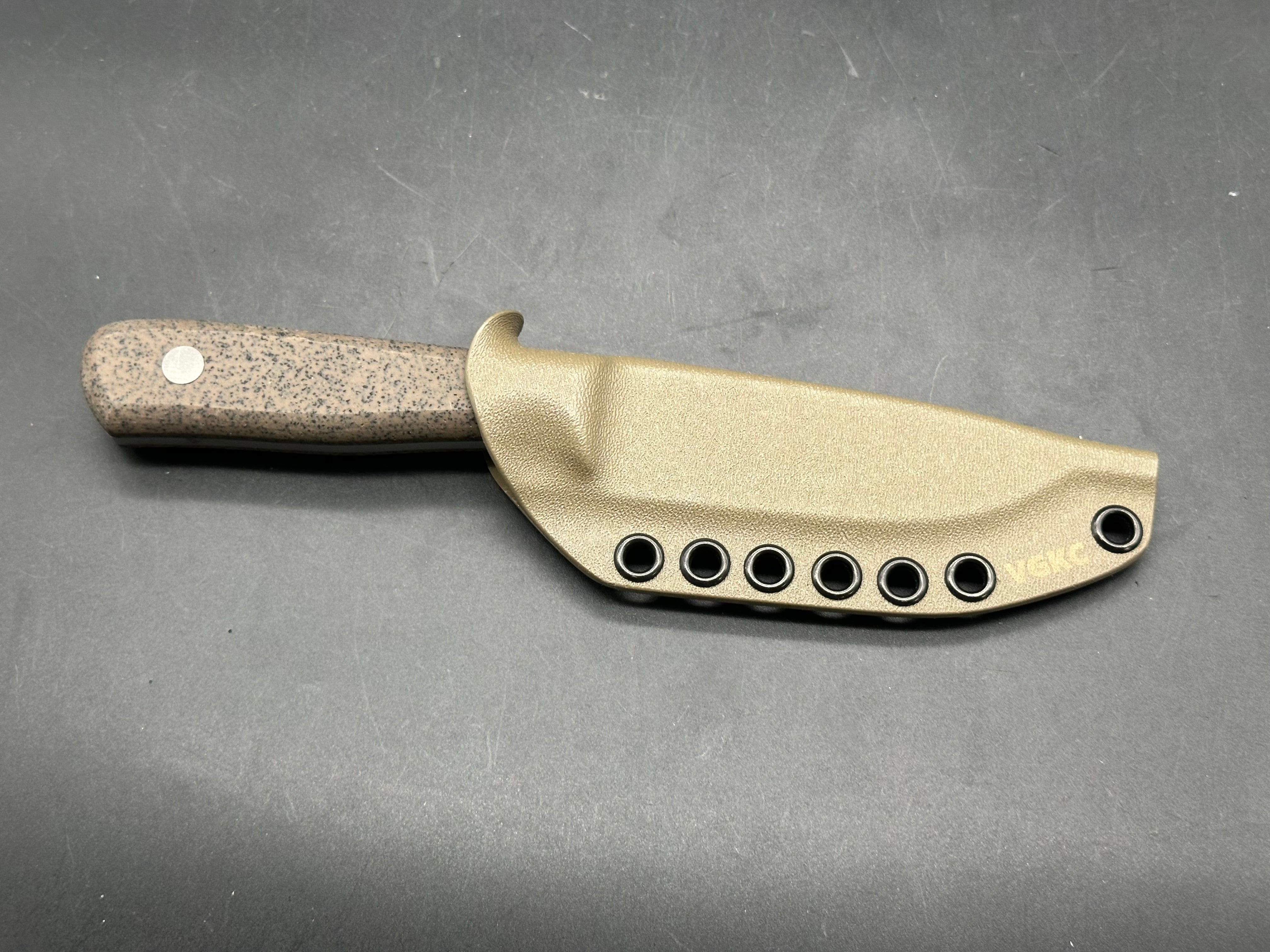 Very Good Knife Company - Mustang in 80CRV2 with tan Griptec handles, hollow grind with factory edge