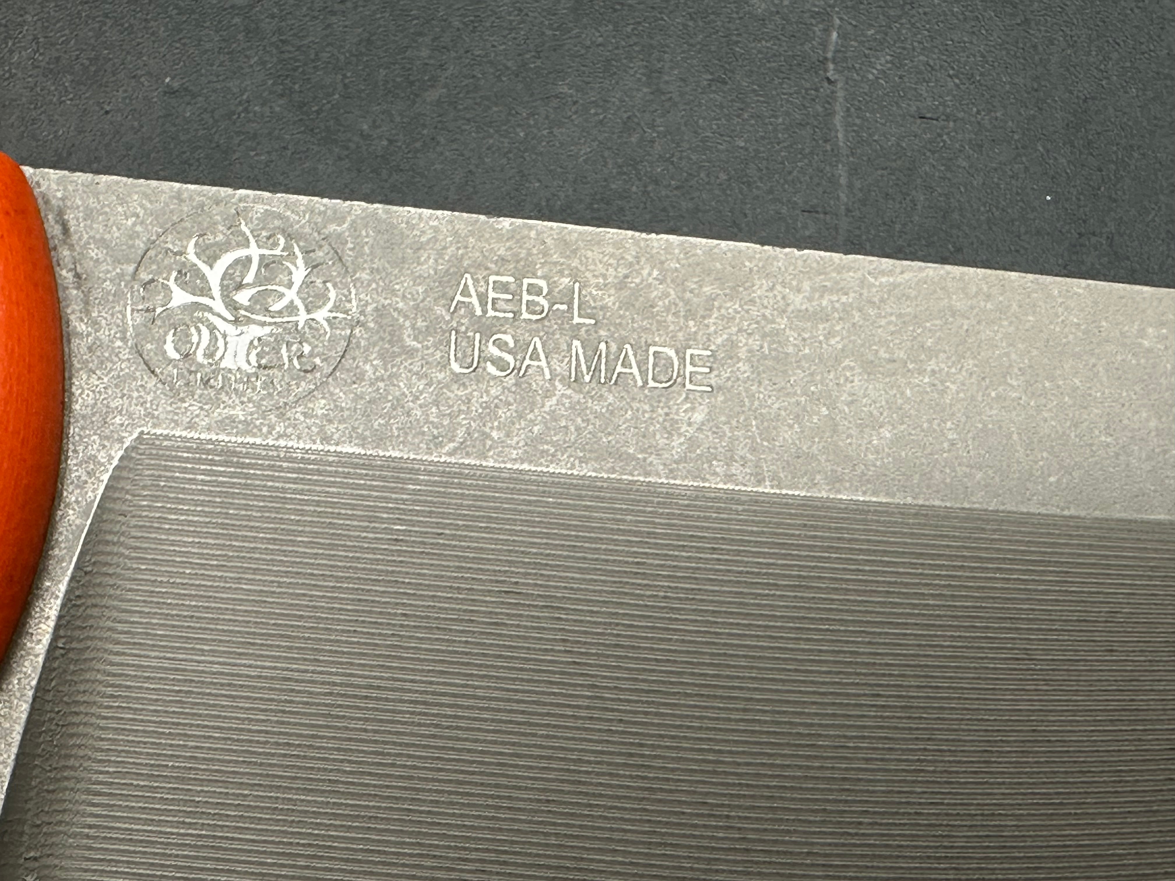 TKell Knives Accomplice in AEB-L with nickel boron coating, 2 sets of G-10 scales black Kydex sheath