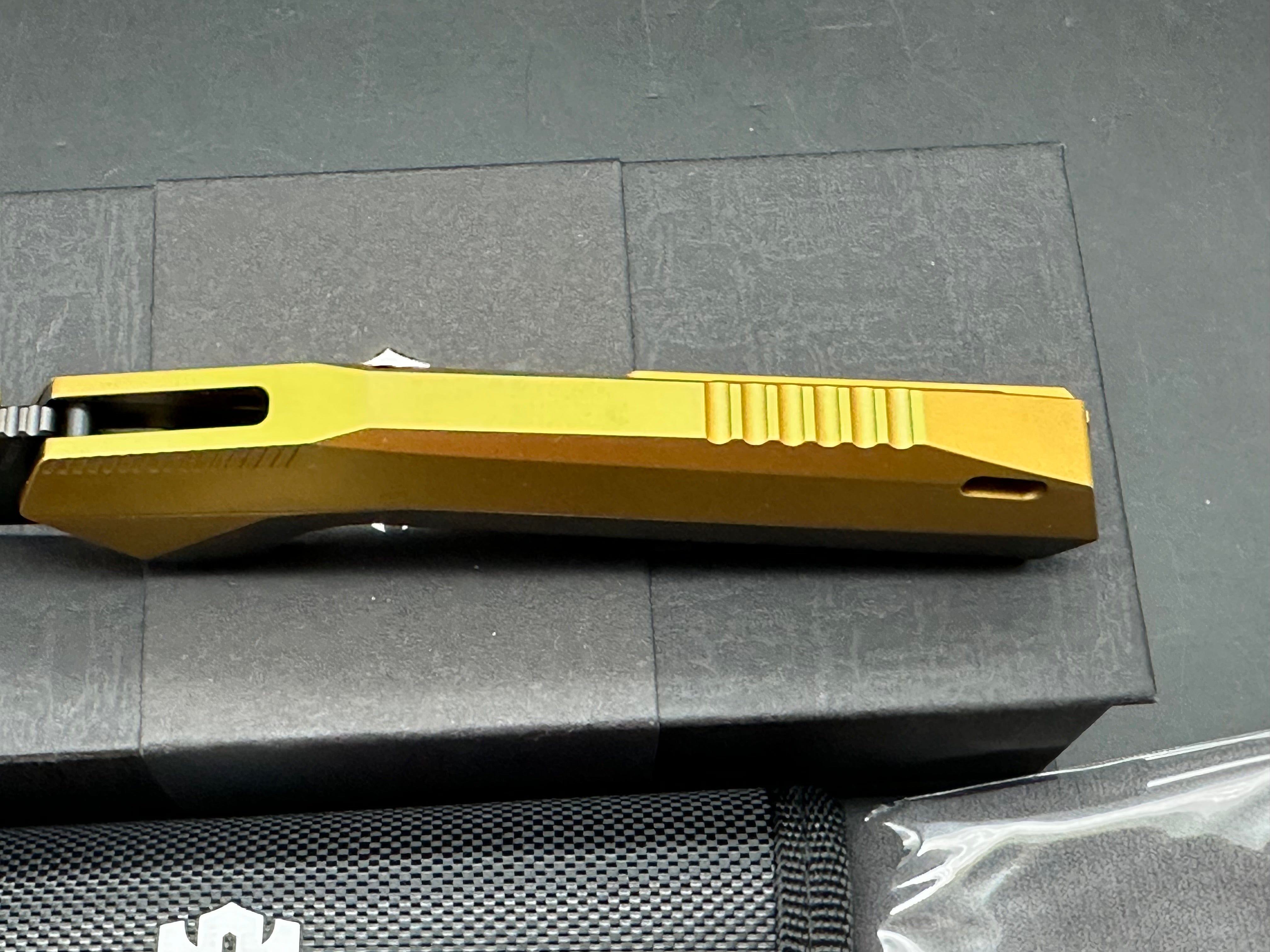 REMETTE RT-WK1-G FOLDING KNIFE BLACK DLC/GOLD TITANIUM HANDLE M390 DROP POINT PLAIN