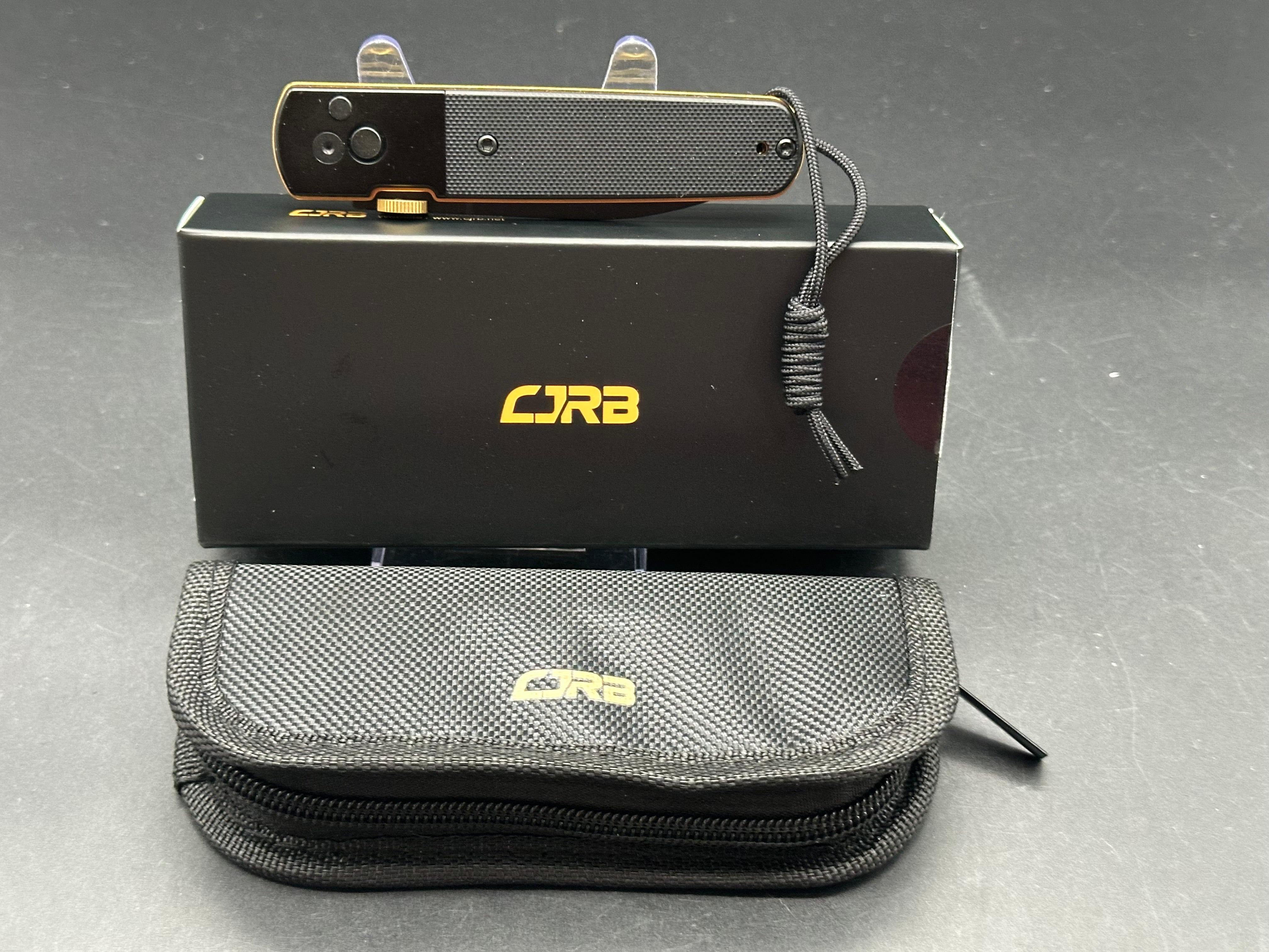 CJRB LOCUST BLACK PVD/G10 HANDLE AR-RPM9 SPEAR POINT