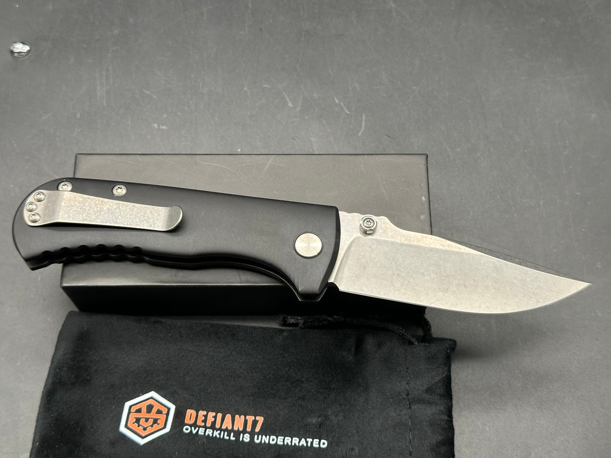 Defiant 7 | Les George Design - Talos, 3.5" MagnaCut Stonewash Drop Point Blade with Black Harden Anodized 6061 Aluminum Scales