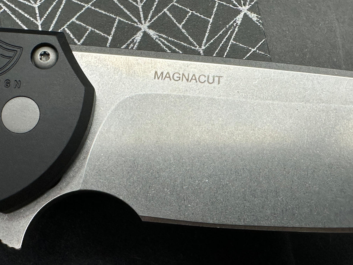 ProTech Mordax, 3.5" MagnaCut Stonewash Drop Point Blade with Black Anodized 6061 Aluminum Scales