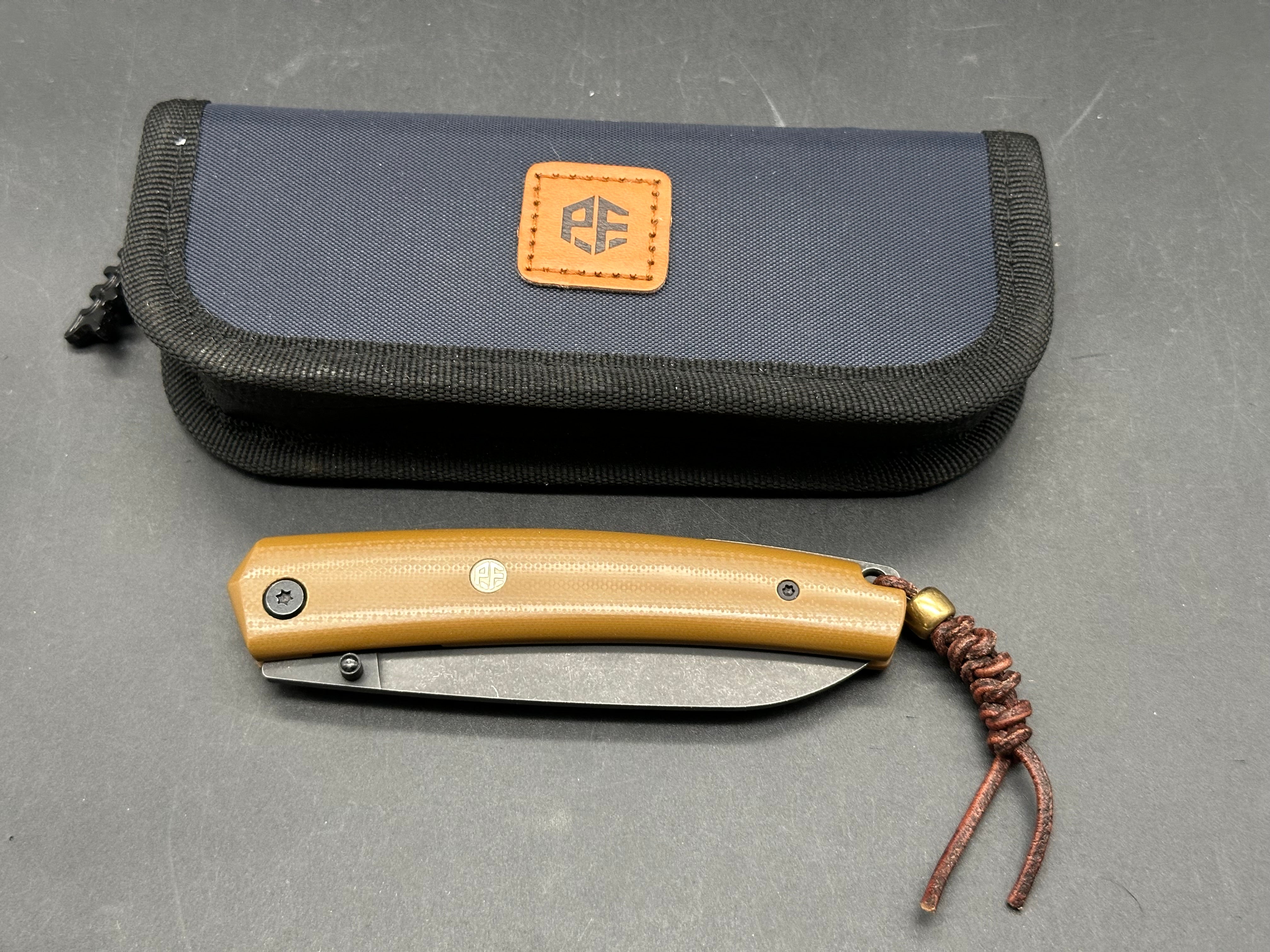 Petrified Fish Patte,3.43" 12C27N Blade,Wood/G10 Handle,Thumb Stud Liner Lock