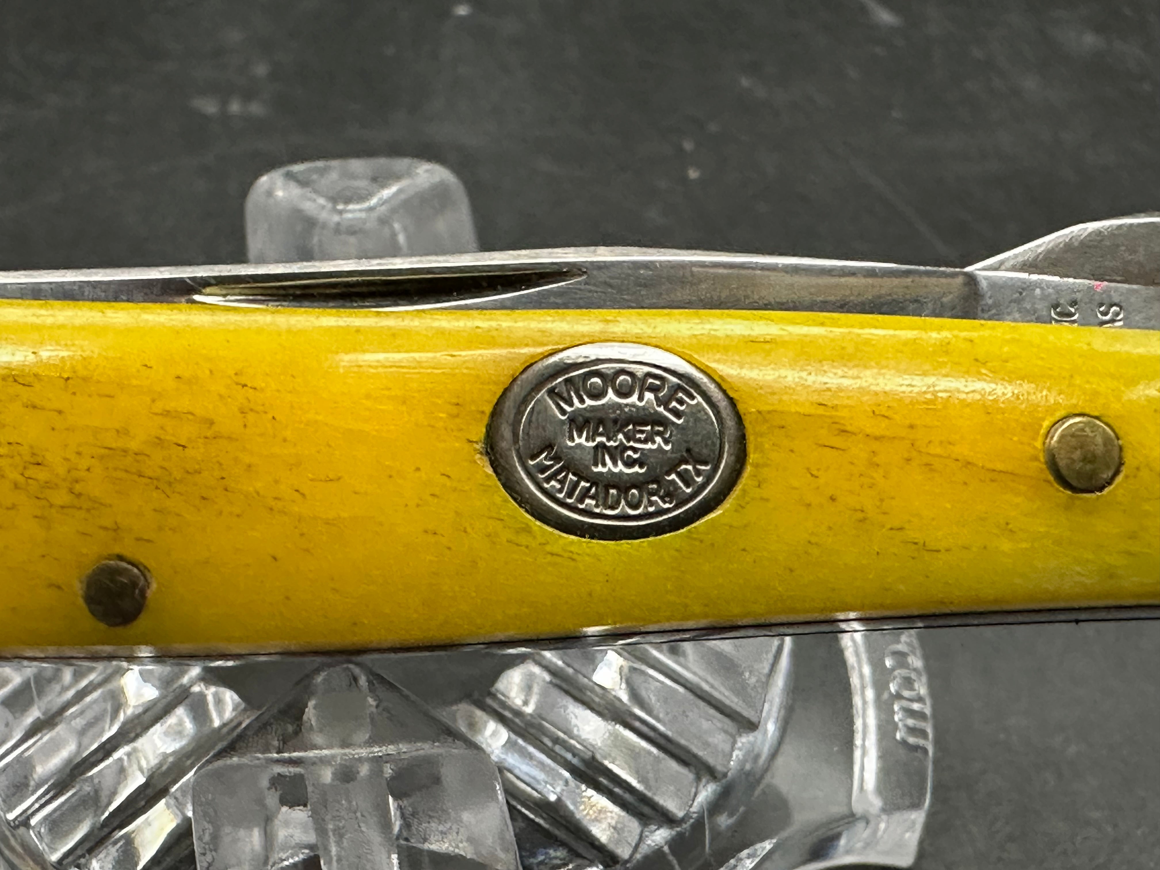 Moore maker liner lock yellow bone