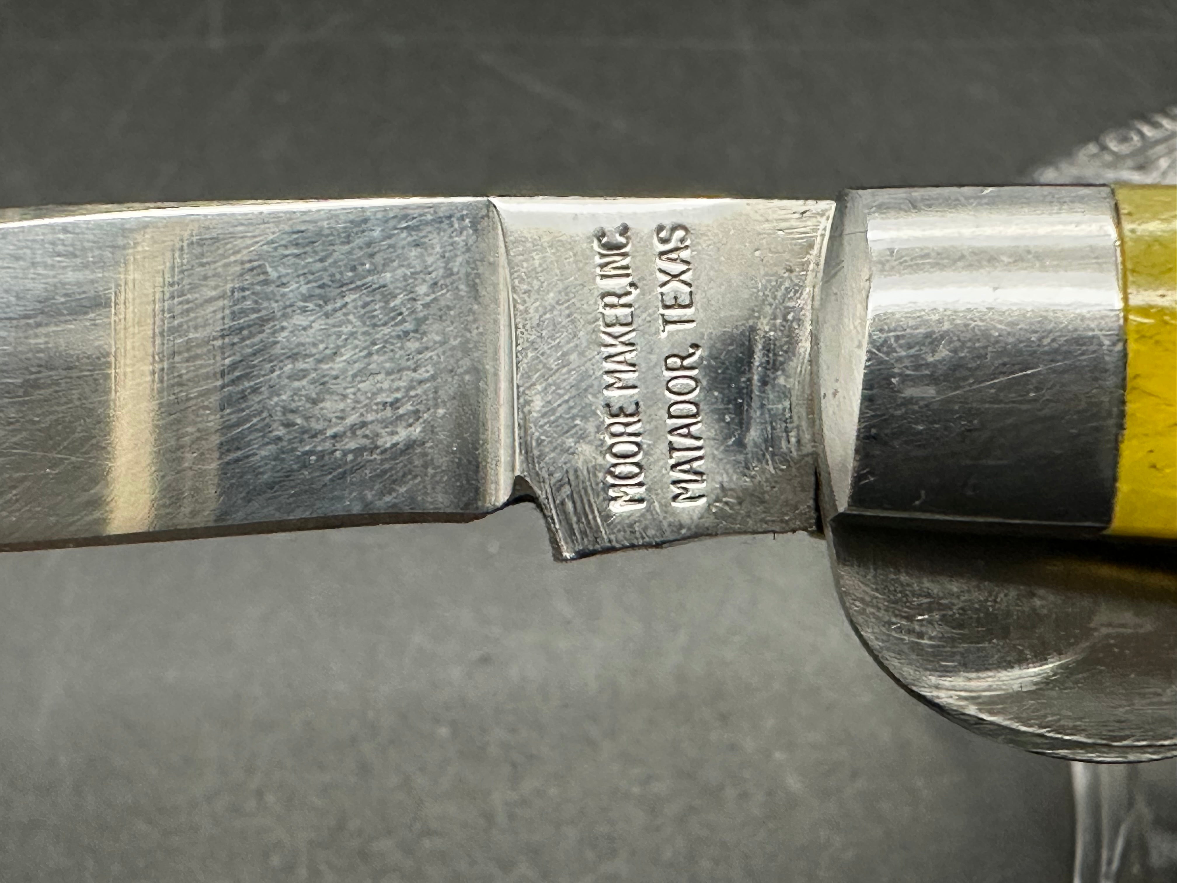 Moore maker liner lock yellow bone