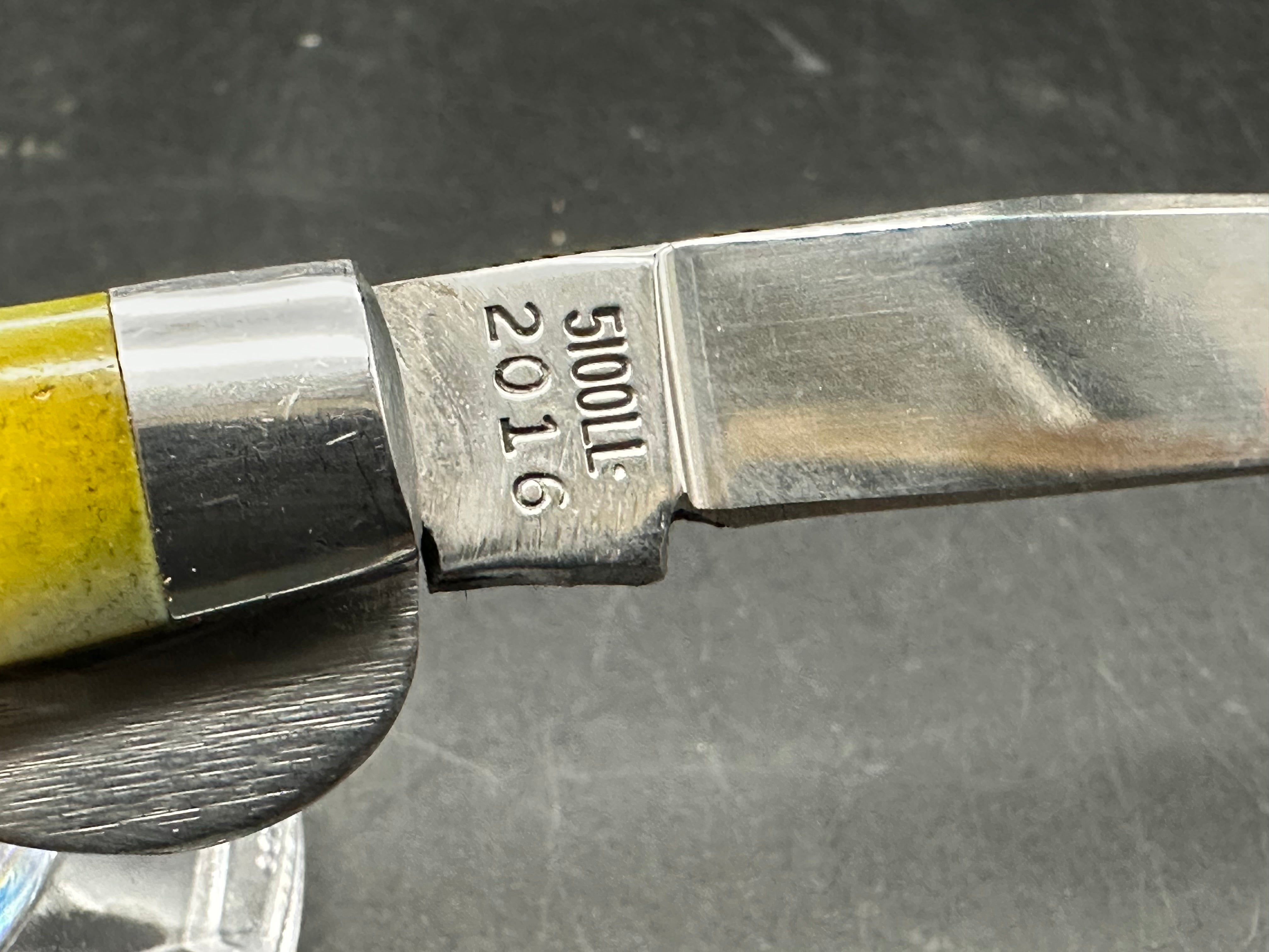 Moore maker liner lock yellow bone