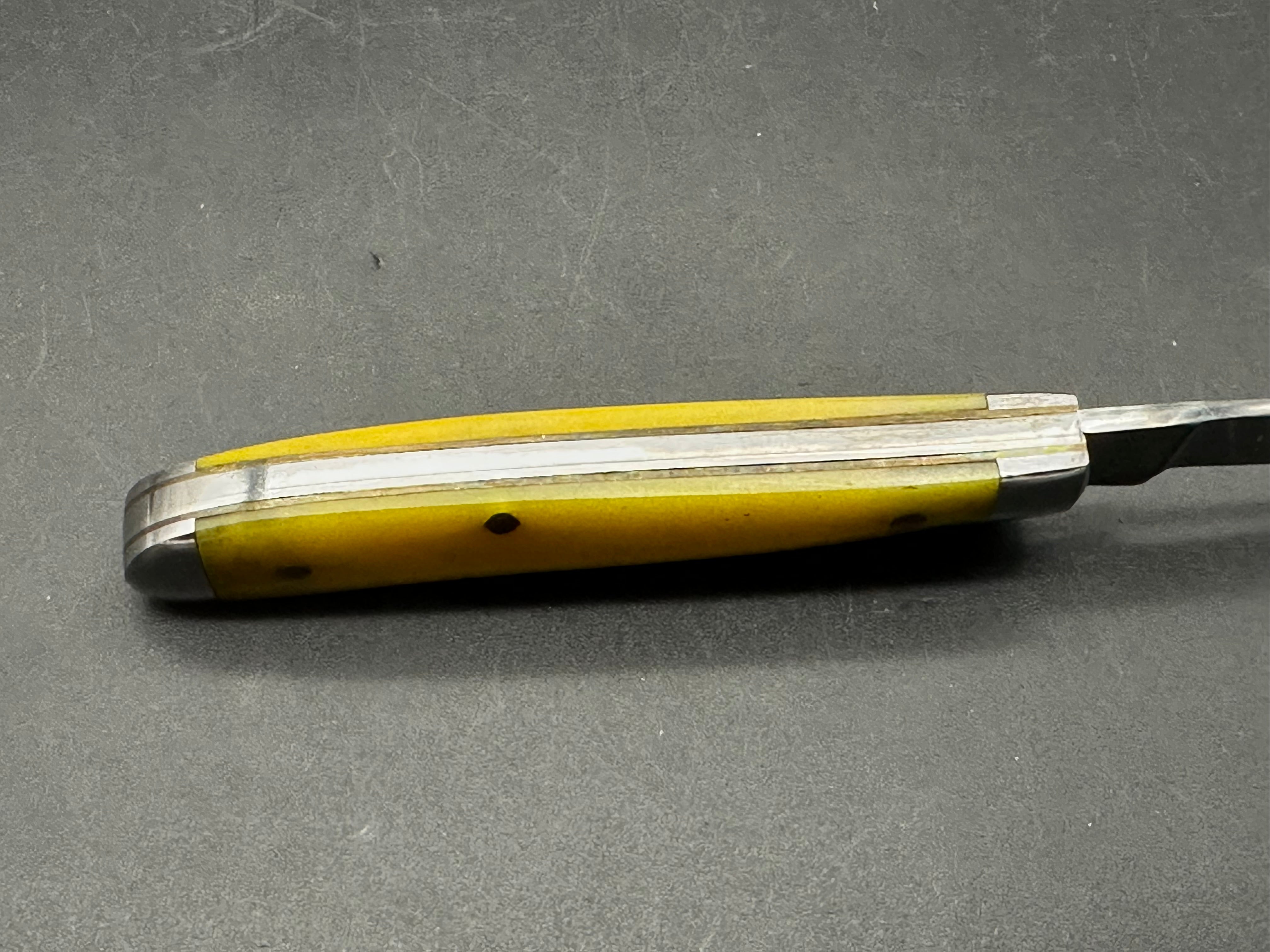 Moore maker liner lock yellow bone