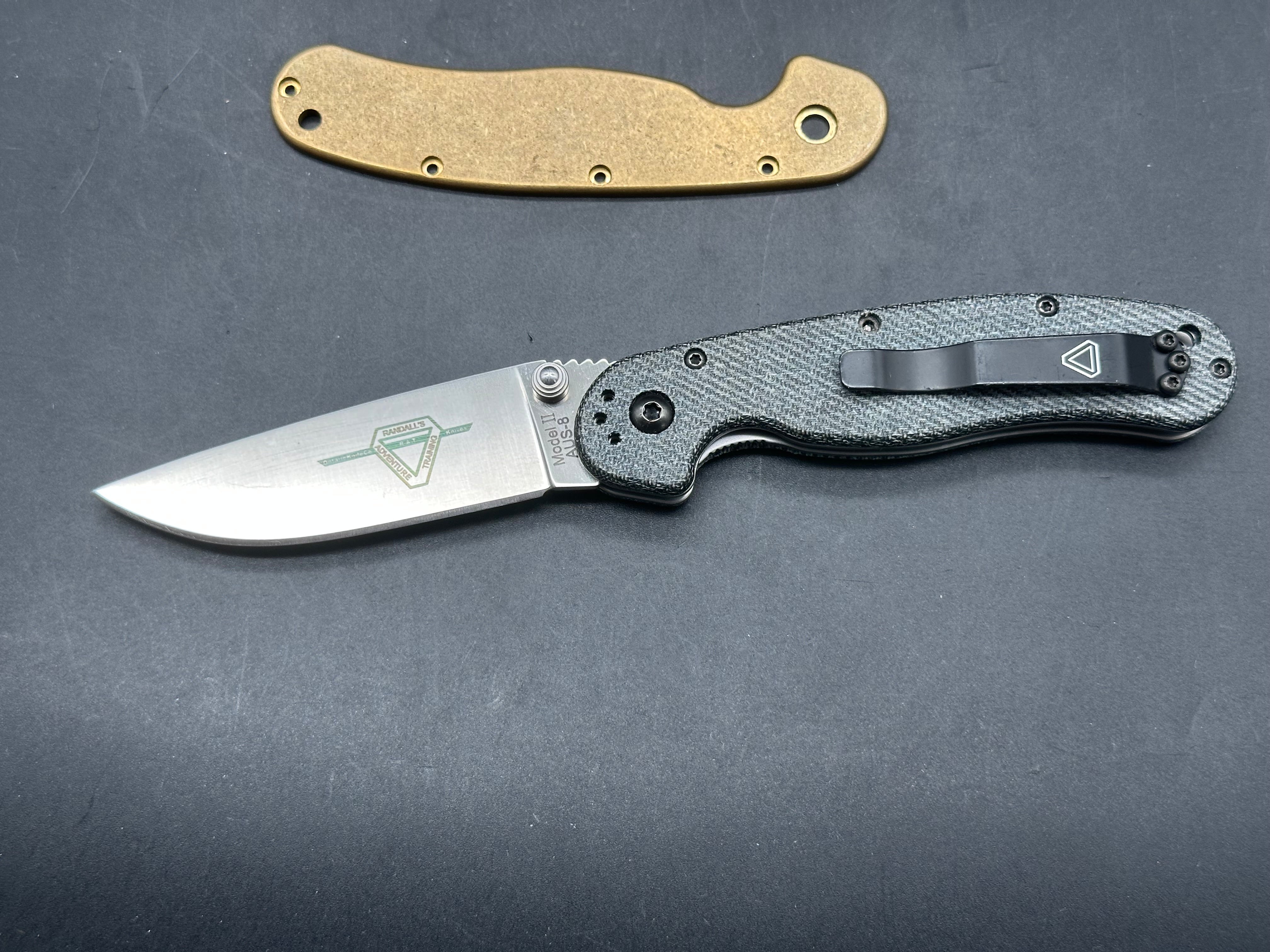 Ontario Rat 2 AUS-8 with blue jean micarta and brass scales