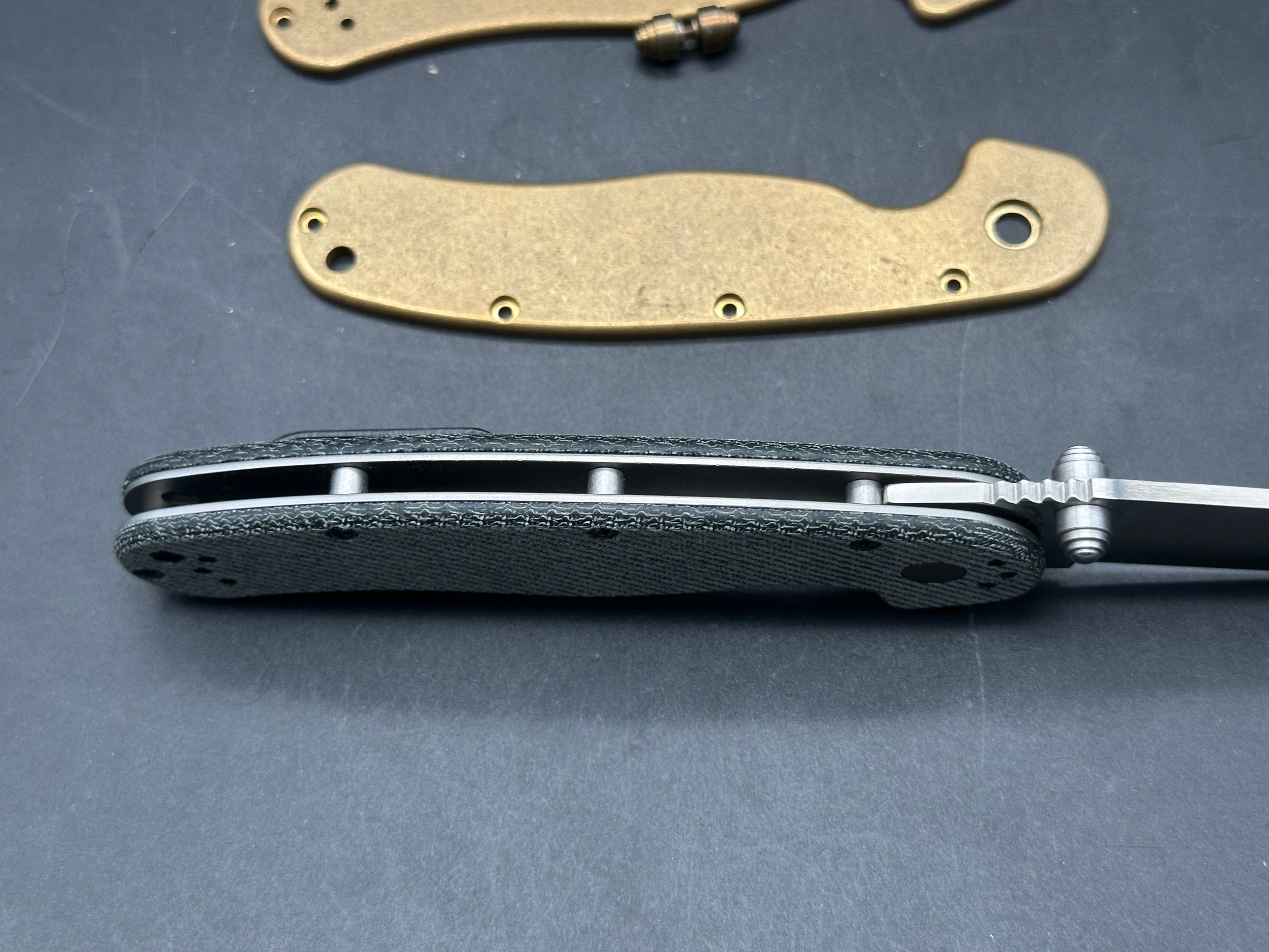 Ontario Rat 2 AUS-8 with blue jean micarta and brass scales