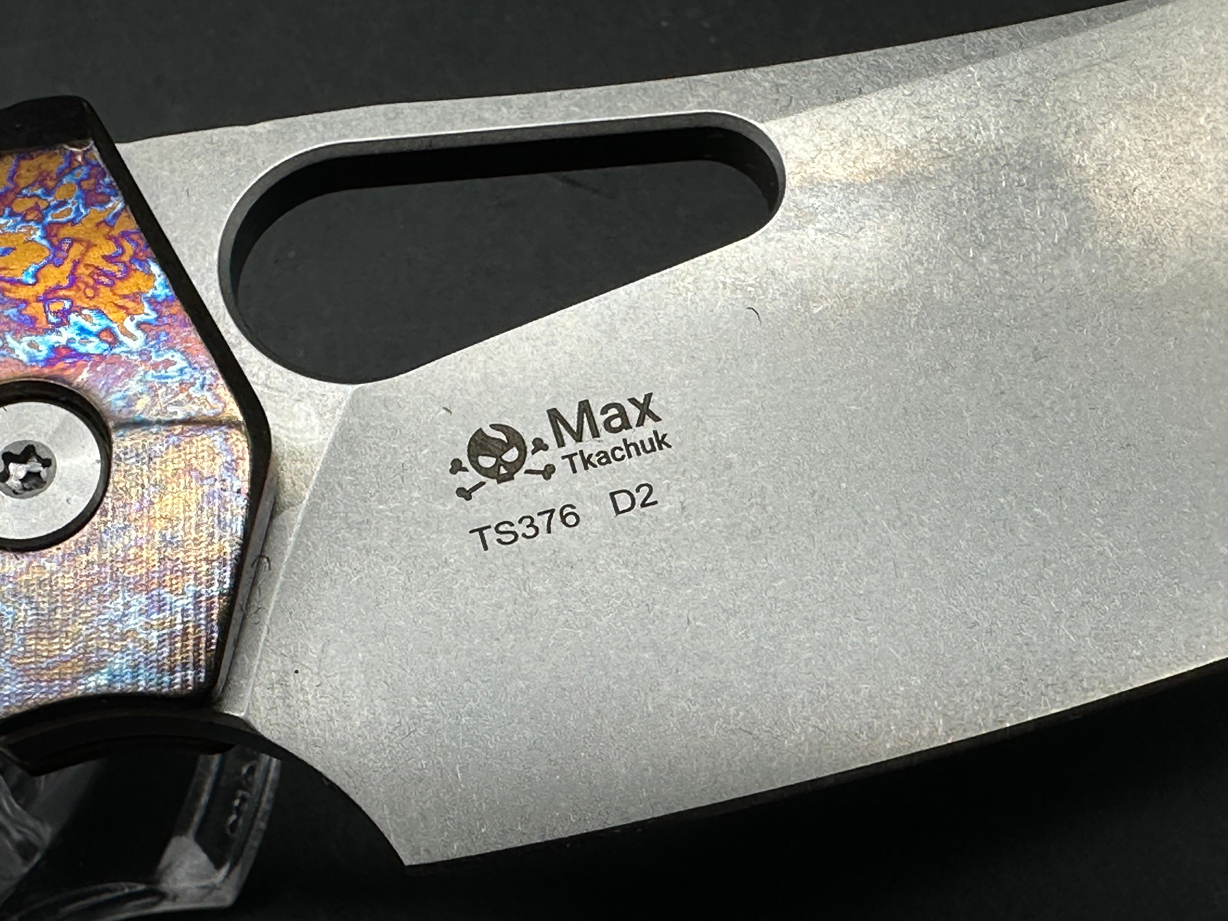 TwoSun TS376 3.66 satin finished D2 blade. Flamed titanium scales and backspacer