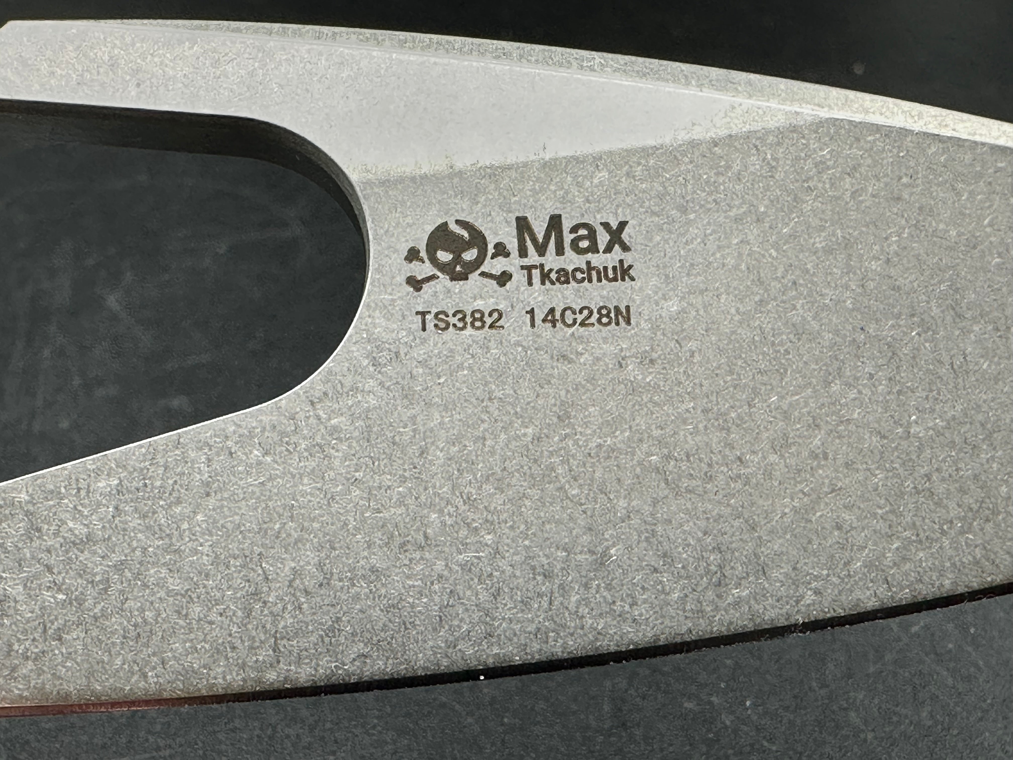 TwoSun TS382 / Tkachuk design. 3.4 inch 14C28N blade. Titanium frame with carbon fiber inlays. Front flipper