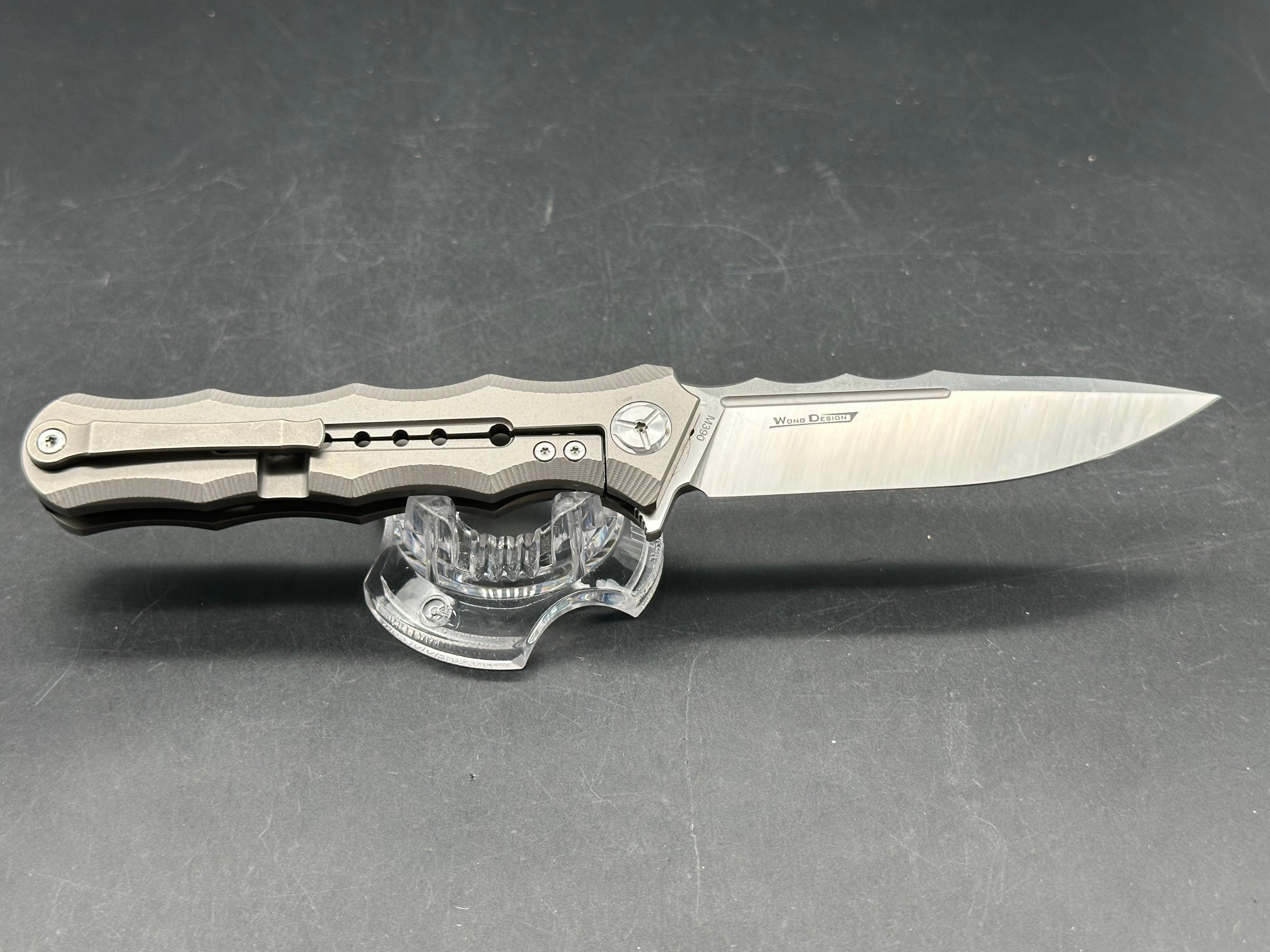 TwoSun TS165 Wong design. 3.5 inch satin finish, flat grind Bohler M390 blade. Titanium frame