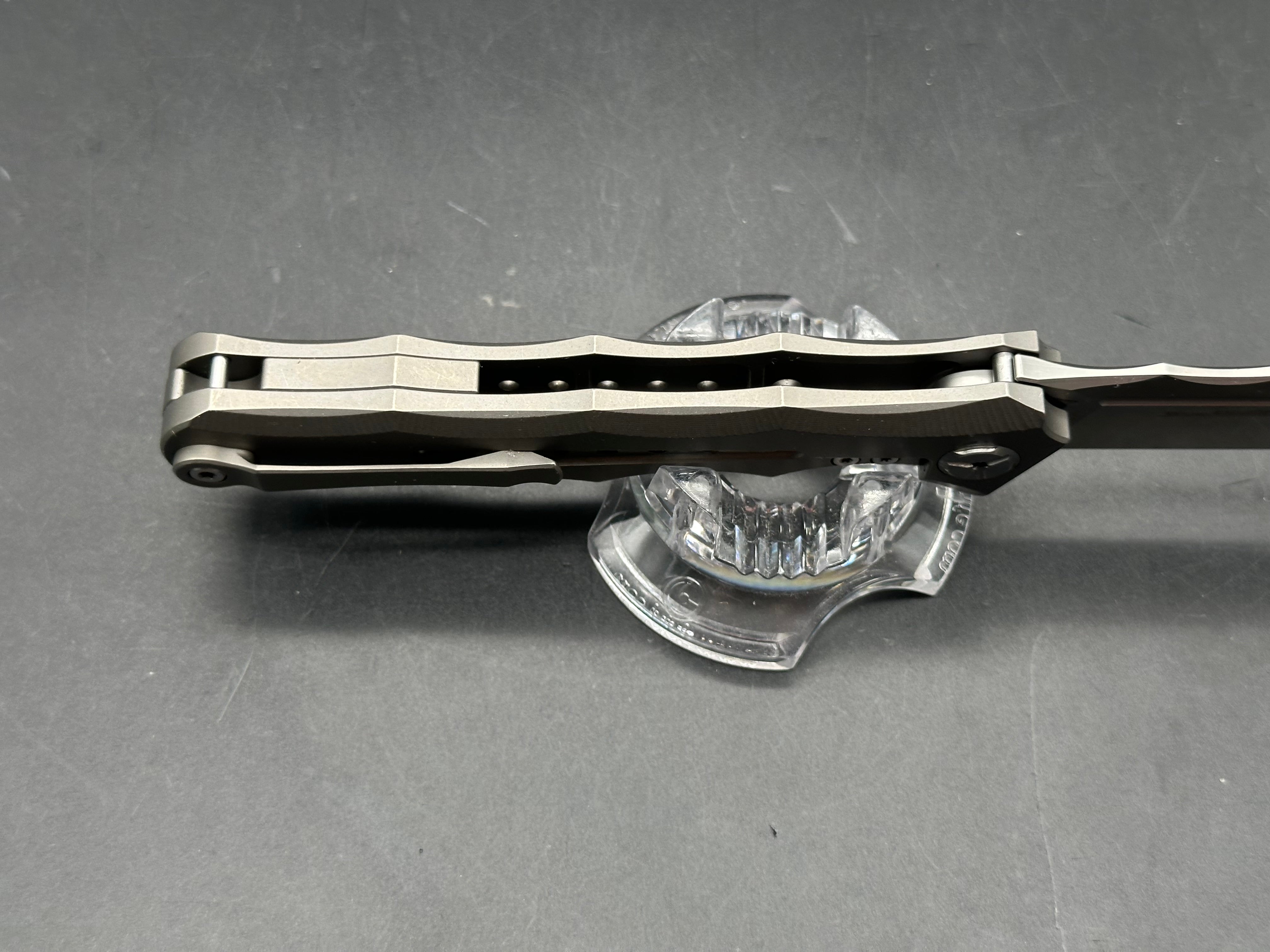 TwoSun TS165 Wong design. 3.5 inch satin finish, flat grind Bohler M390 blade. Titanium frame