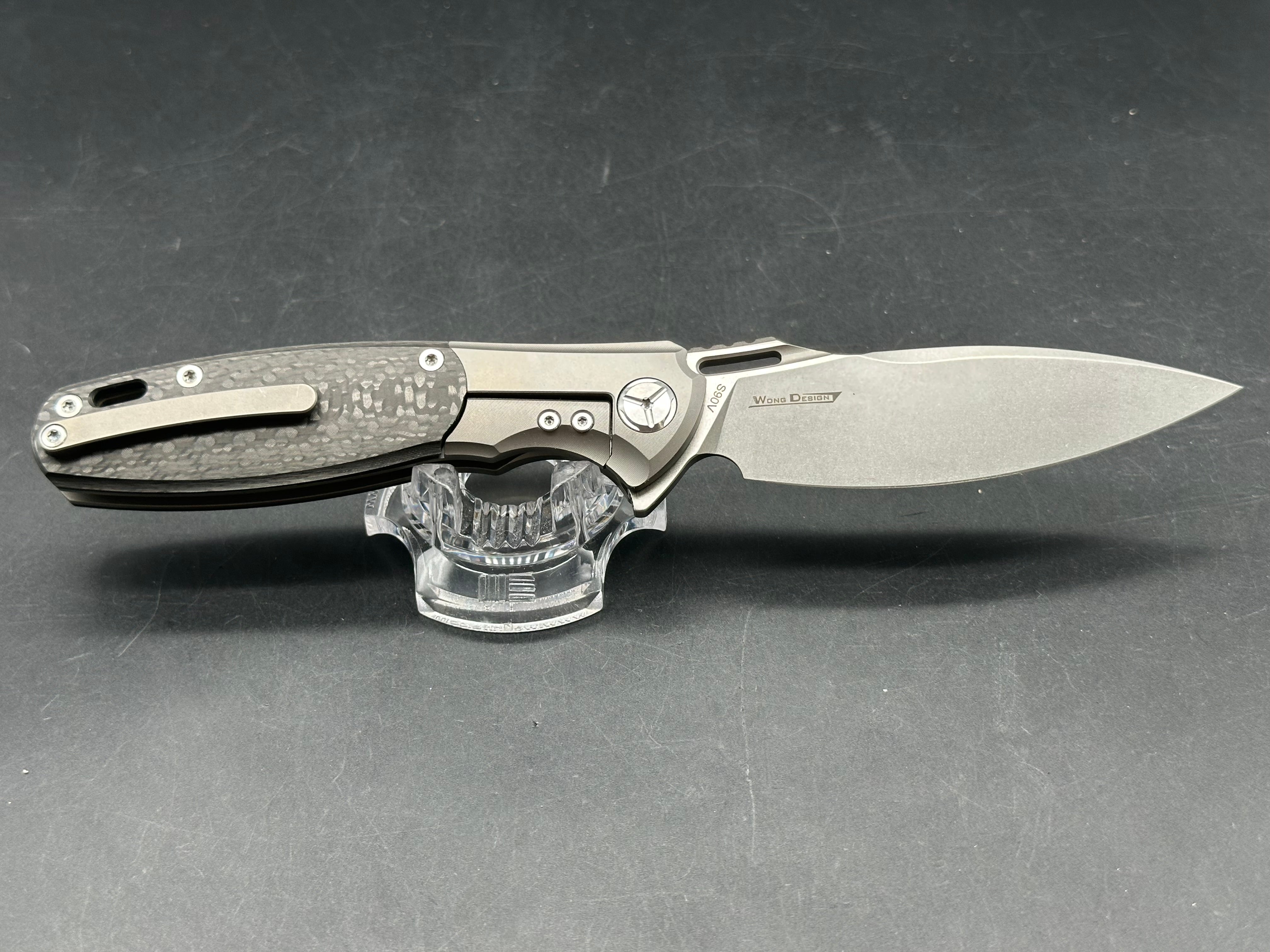 TwoSun TS162 Wong design. 3.66 inch CPM-S90V blade. Frame lock. Titanium and carbon fiber scales